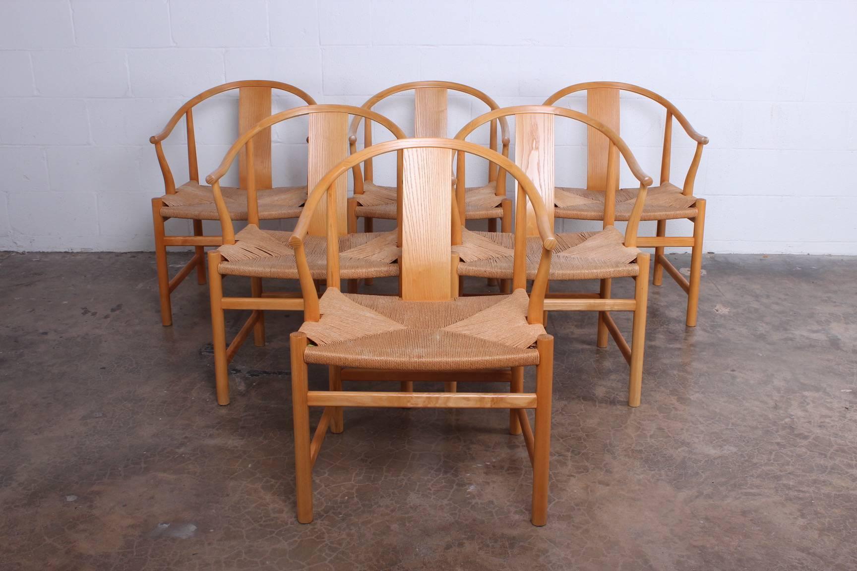 A rare set of six oak Chinese chairs designed by Hans Wegner for PP Mobler.