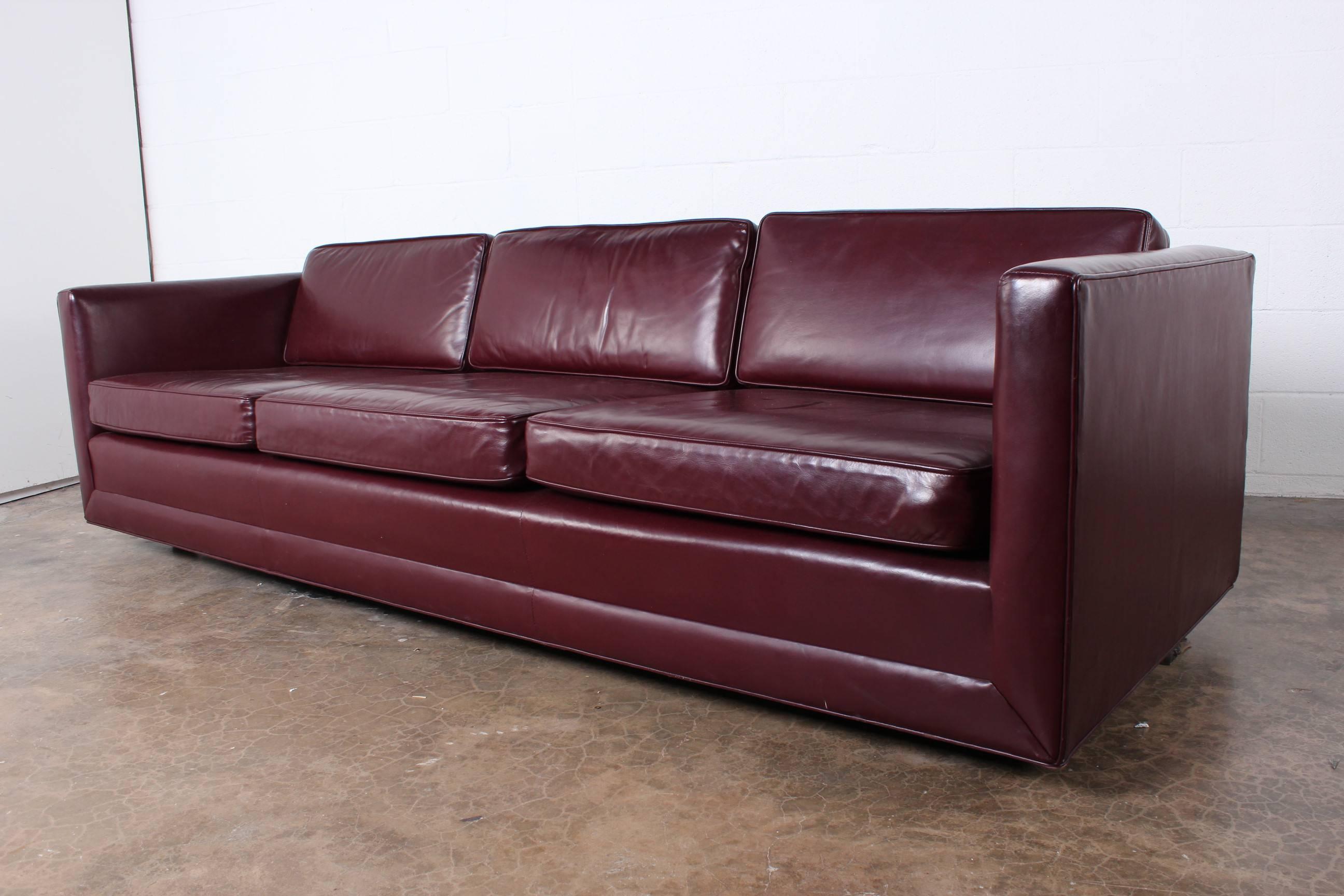 Large sofa in original burgundy/oxblood leather designed by Ward Bennett for Brickel.