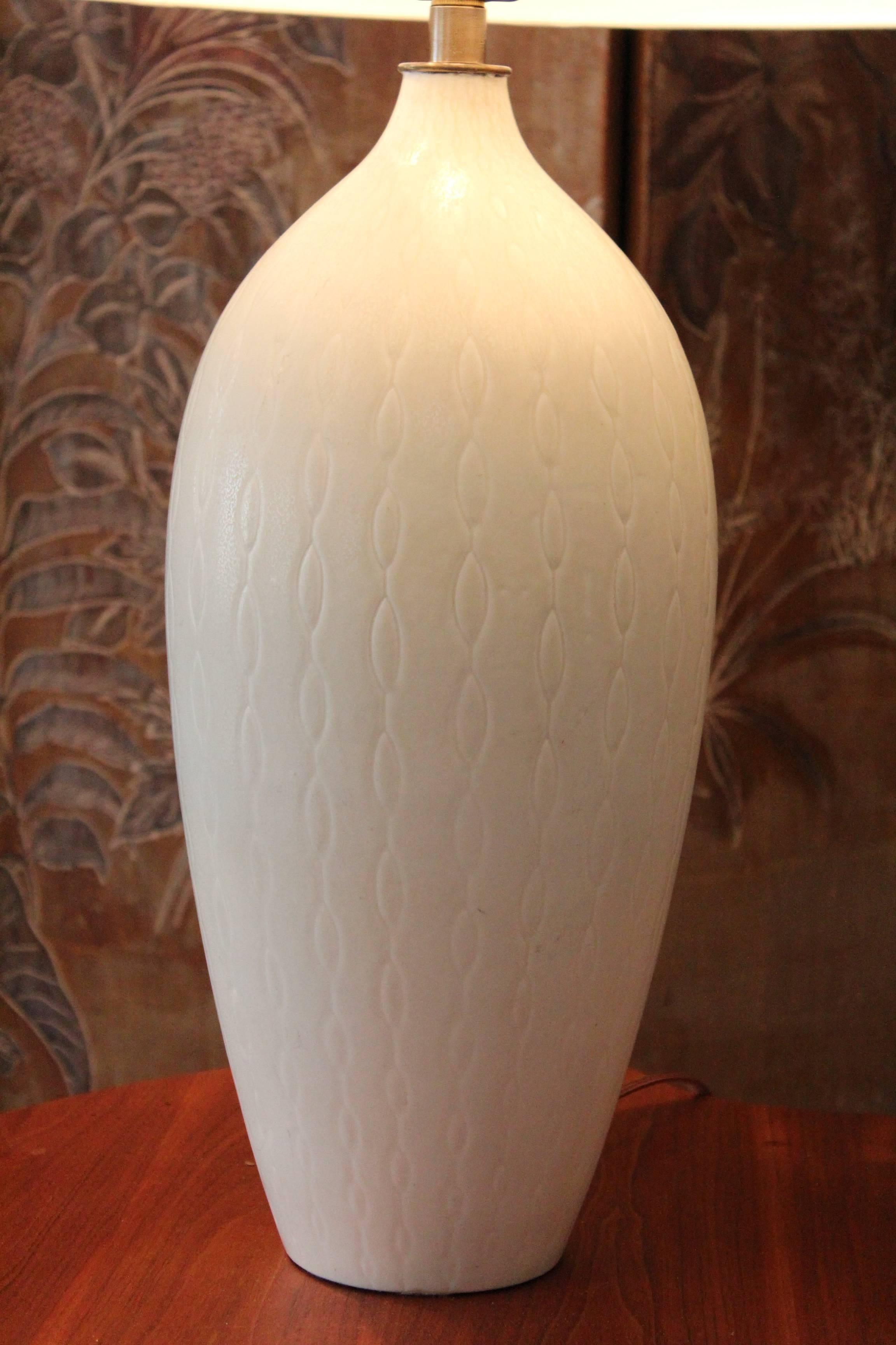 A beautifully glazed Swedish table lamp by Carl Harry Stalhane for Rörstrand. Rewired with new silk shade. 
