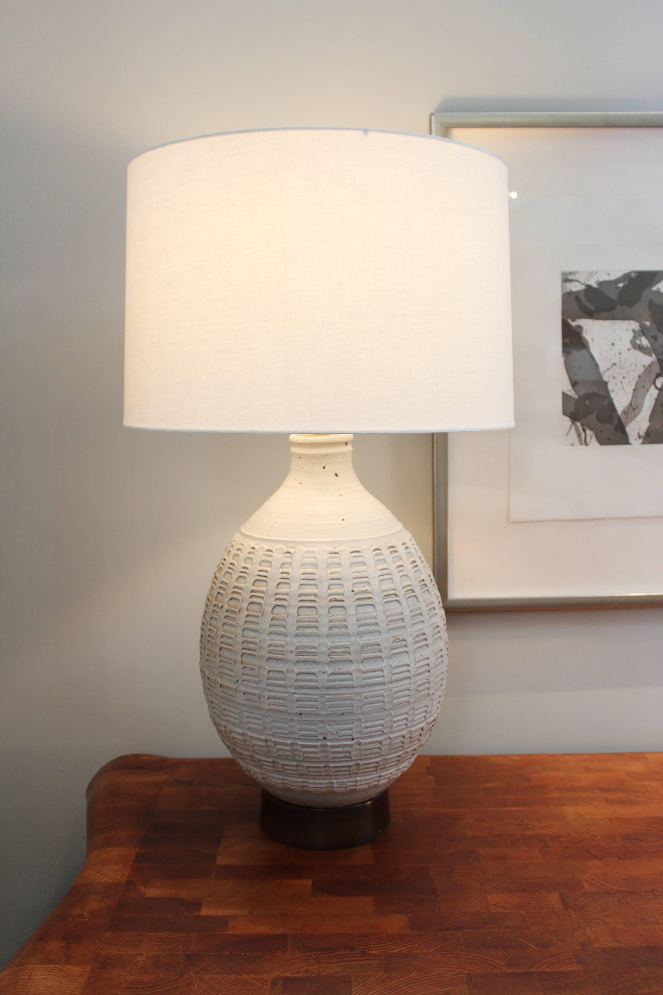 A large textural ceramic table lamp by affiliated craftsman of California.