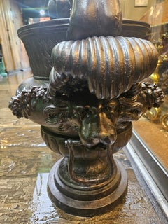 Pair of Bronze Cherub Urns