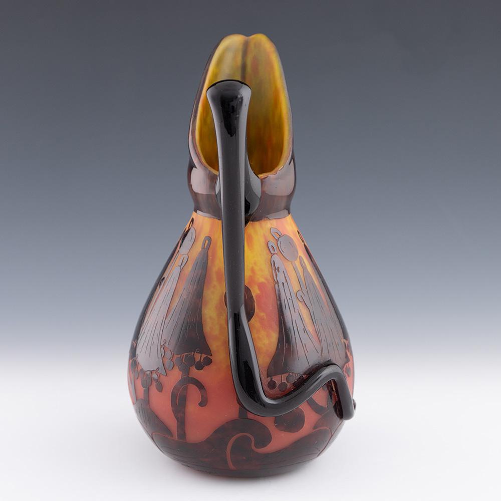 Heading : Schneider Verre Francais Pitcher in the Campanules pattern
Date : c1924
Origin : Epinay-sur-Seine, France
Bowl Features : Orange and lemon mottled ground with red-brown high relief cameo. Depicts campanules (bell flowers) at sunset – truly