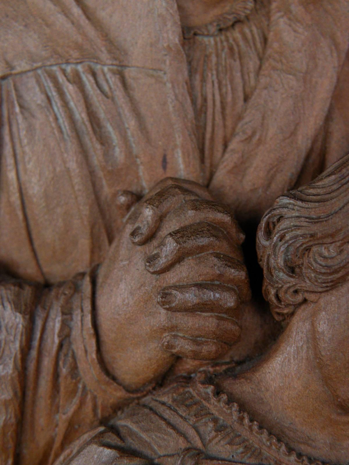 Carved 19th century Bas-Relief by Peter Nocker after Hans Holbein's Darmstadter Madonna For Sale