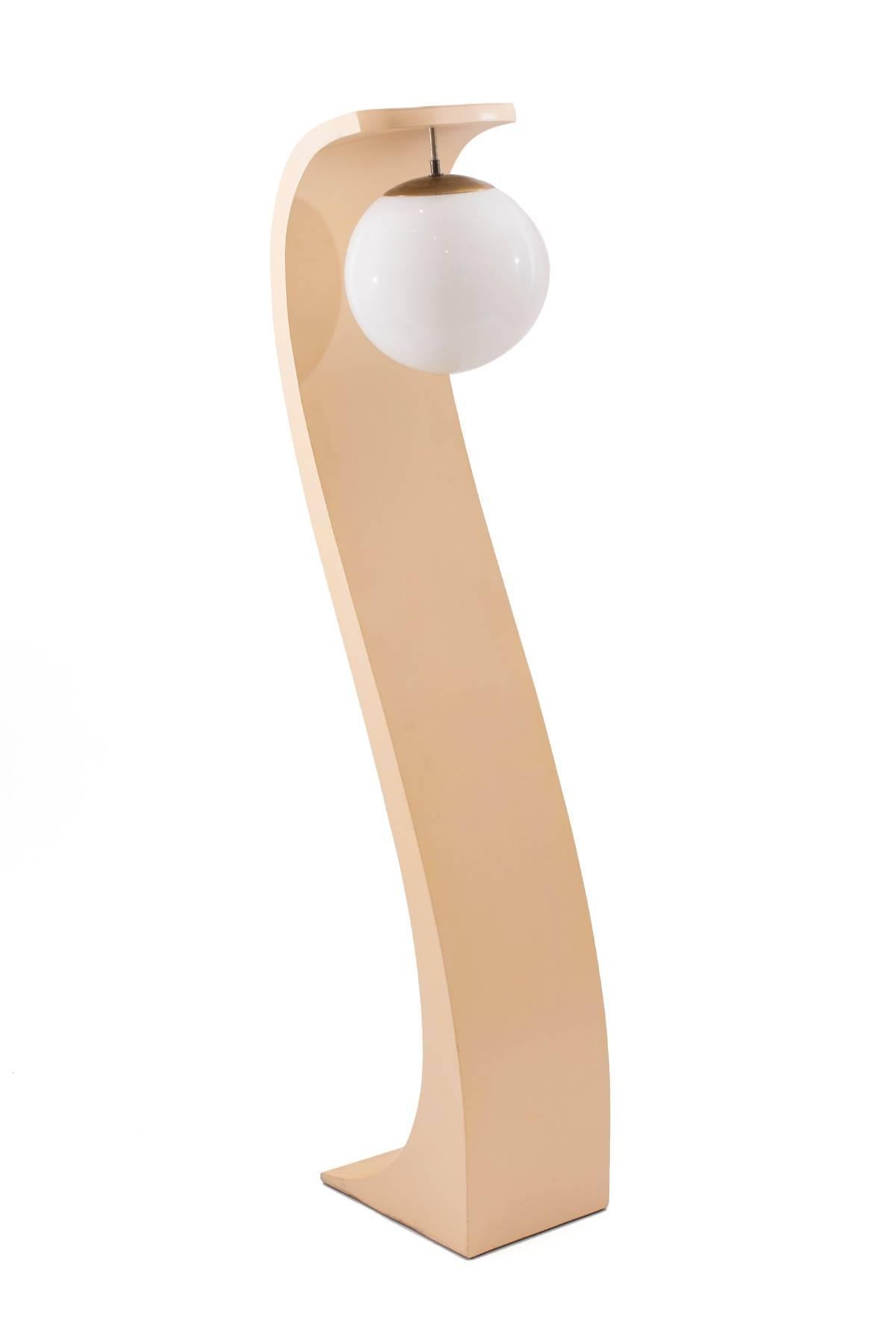 Sculptural cobra floor lamp by Modeline circa early 1970's. This example has its original off white lacquer with glass shade. Please see Red's other listings for a pair of large scale table lamps by Modeline. 