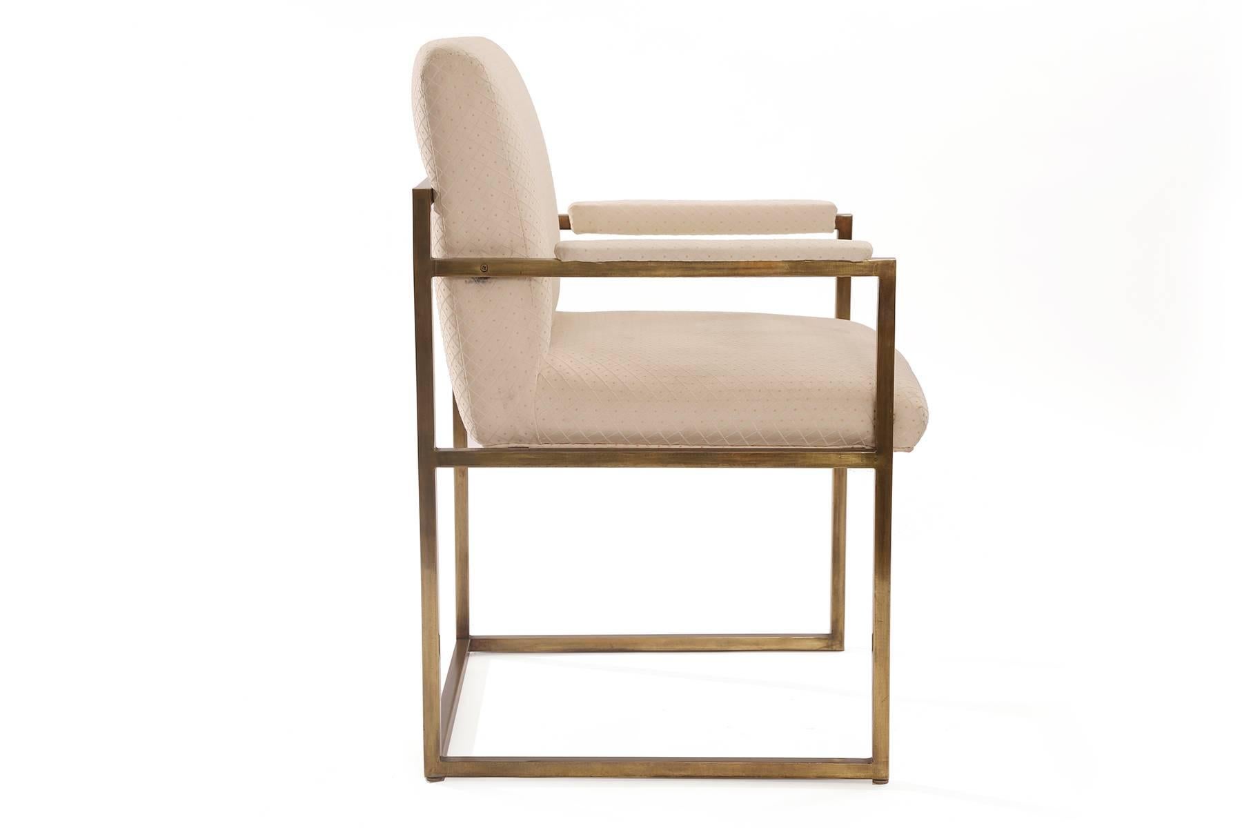 Milo Baughman for Thayer Coggin bronze and upholstered dining chairs circa early 1970s. There are two armchairs and two sides with flat bar bronze frames. These need to be reupholstered and we can happily upholster these in the leather or fabric of