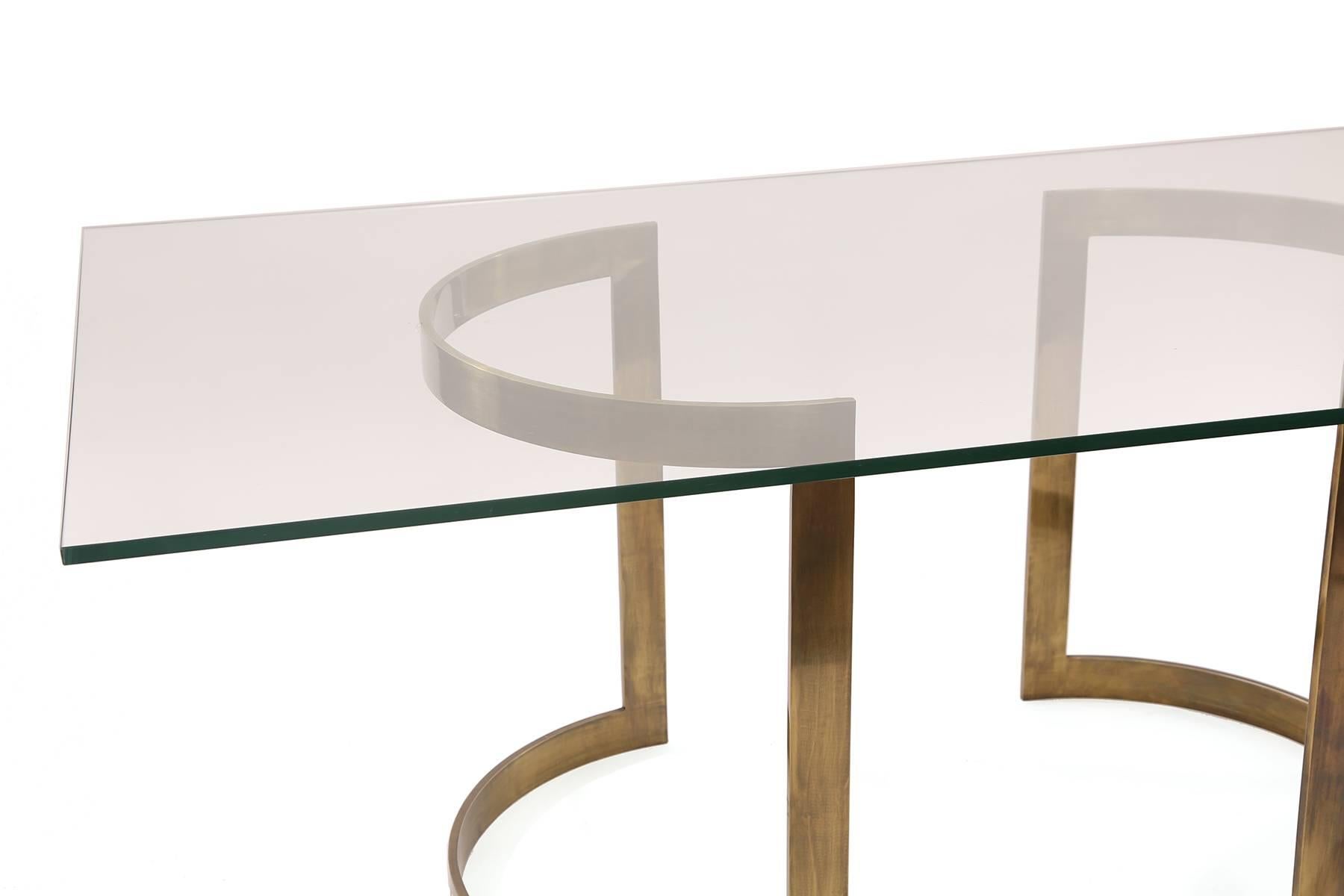 Milo Baughman for Thayer Coggin bronze dining table, circa early 1970s. This all original example has two beautifully formed oiled bronze bases. The glass in the photos is 6' long but can be larger or smaller if needed. Price listed is for the bases