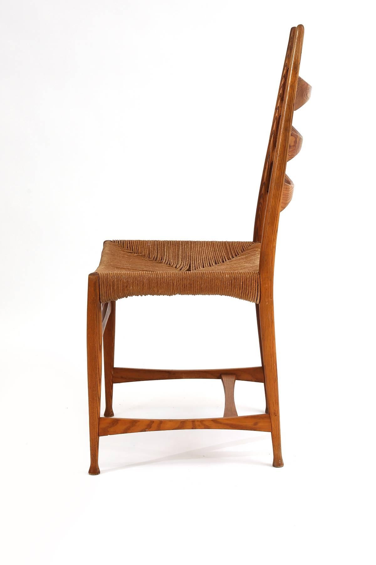 Italian Four Paolo Buffa Sculpted Oak and Raffia Dining Chairs