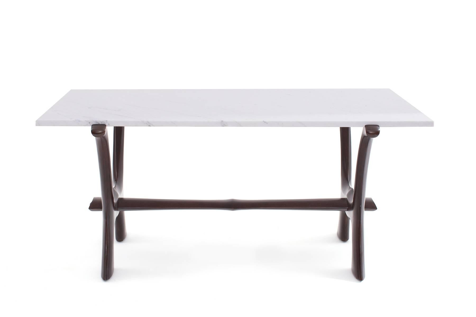 Teak and Calacatta marble cocktail table by Fredrik Scriever-Abeln, circa mid-1960s. This lovely example has a newly finished solid teak base that supports a stunning piece of polished Calacatta marble.