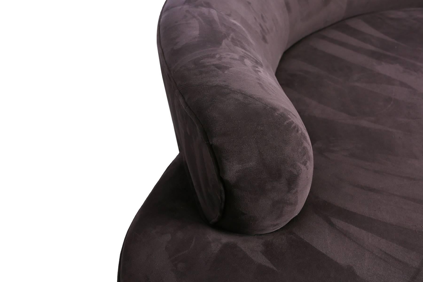 Free-form Vladimir Kagan for Directional sofa. This all original example has a Lucite stretcher and is upholstered in the original Aubergine ultrasuede. Retains original label. Please see our other listings for a serpentine sofa by Kagan.