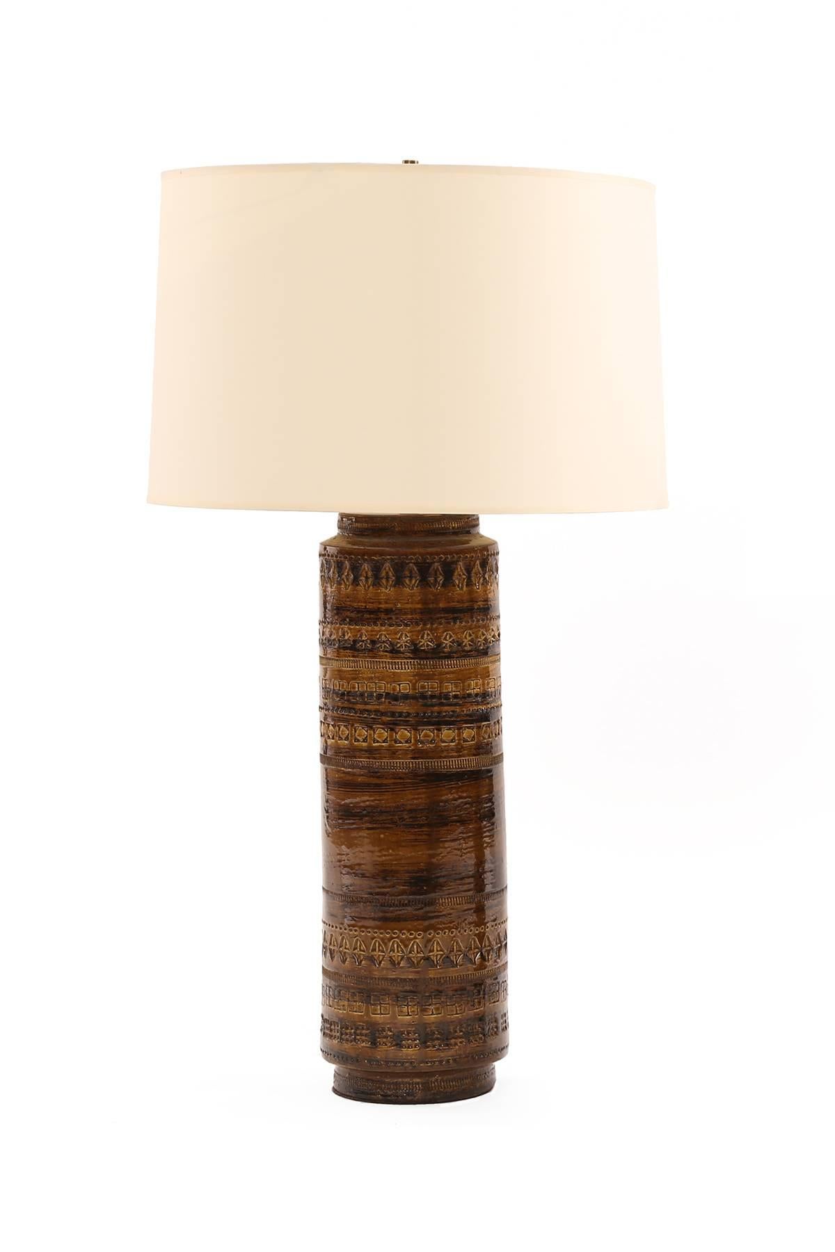 Striking pair of Aldo Londi for Bitossi glazed ceramic lamps, circa late 1960s. These examples have beautiful earth tone glazing and Londi's iconic texture.
Price listed is for the pair without shades. Height listed below is to the top of the