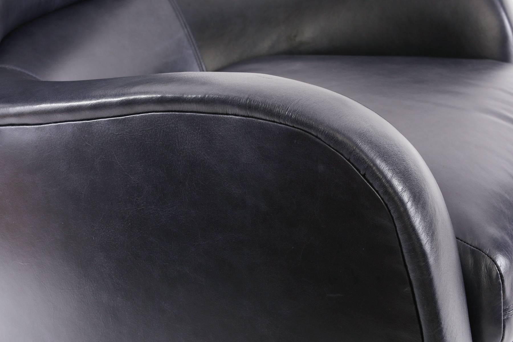 American Pair of Vladimir Kagan Leather and Walnut Swivel Lounge Chairs