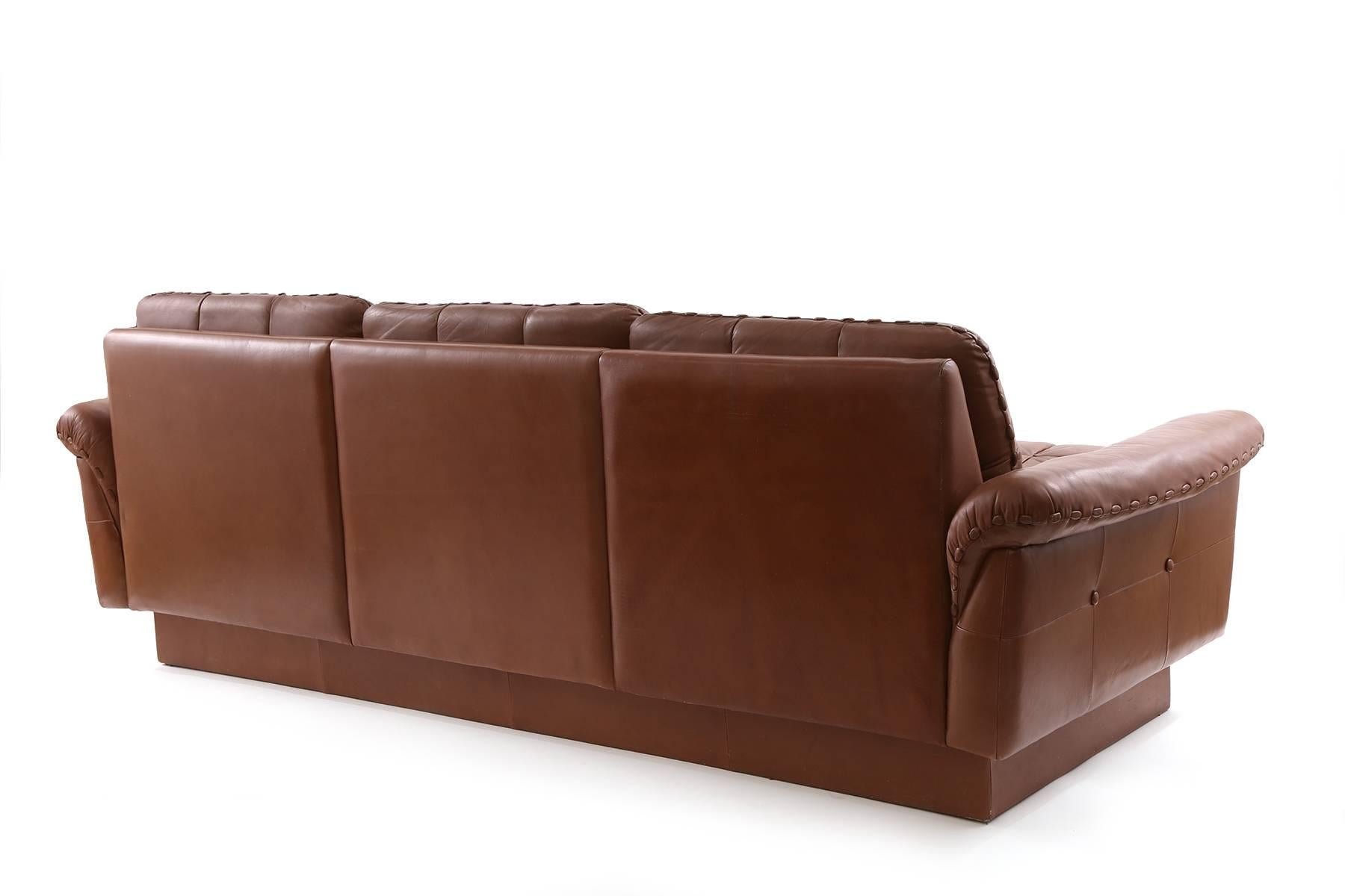 leather sofa with baseball stitching
