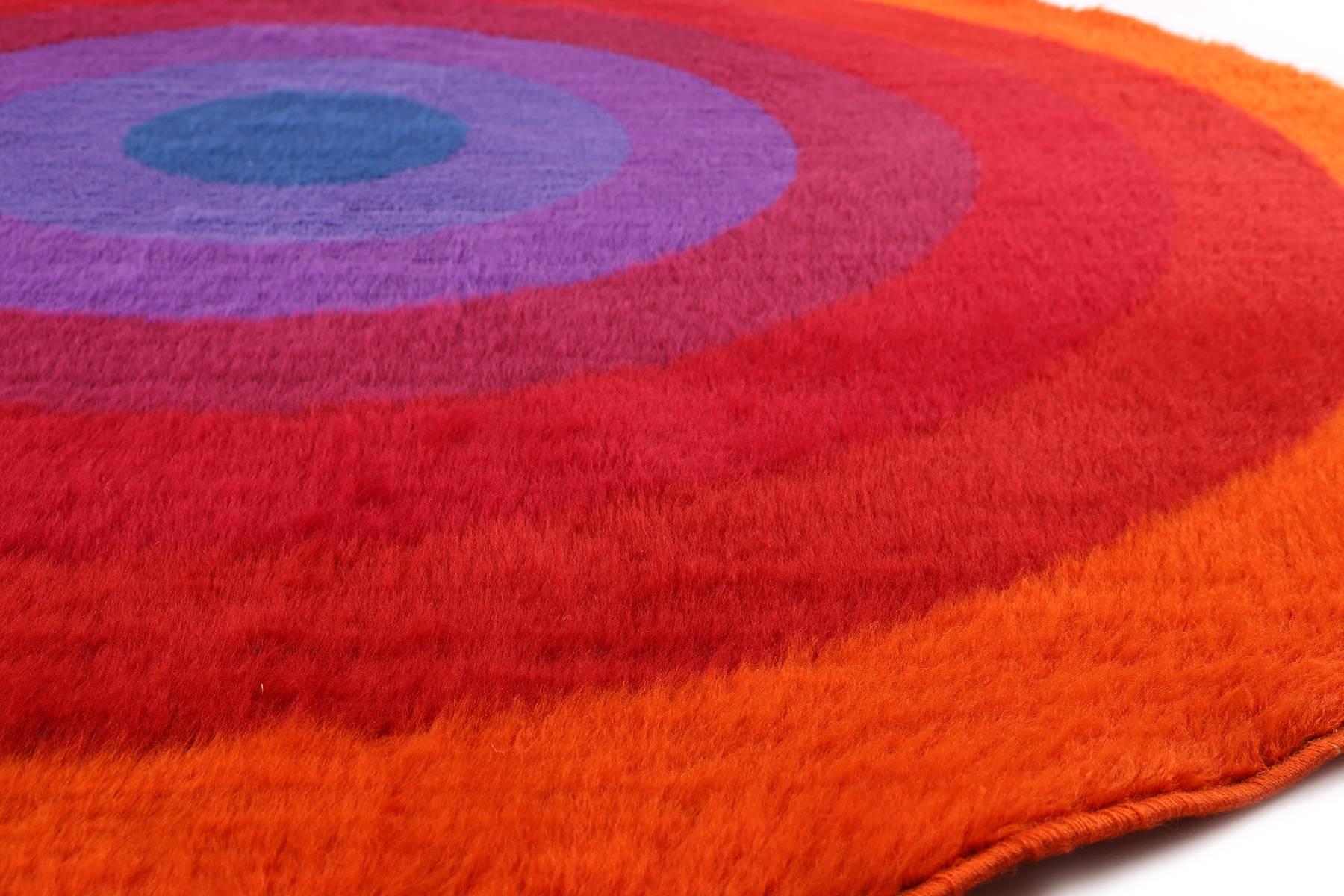 Rare Verner Panton ‘Mira Romantica’ 98″ diameter rug for Mira- X, circa mid-1970s. This all original example is made of wool and incorporates hues of oranges, crimsons, reds and purples. Recently cleaned the colors truly pop.