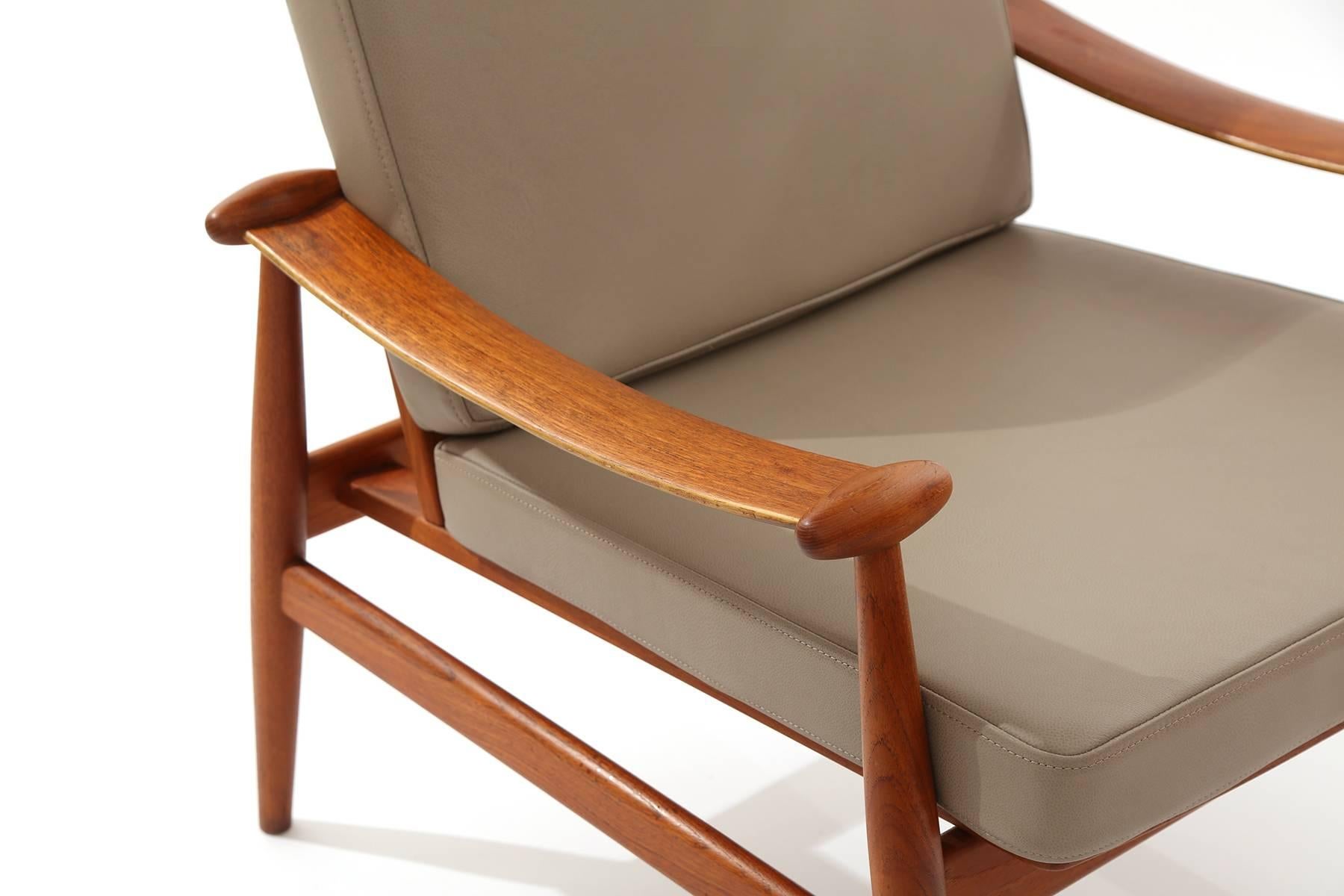 Mid-Century Modern Pair of Finn Juhl Teak & Leather Lounge Chairs