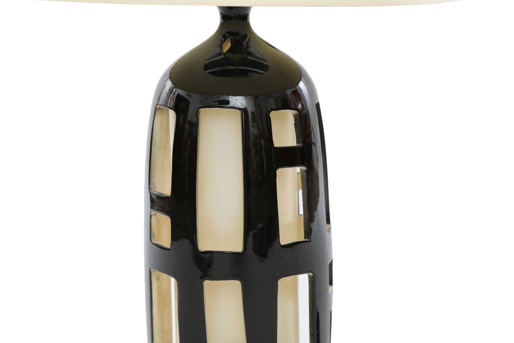 American Striking Pair of Cut-Out Ceramic Lamps