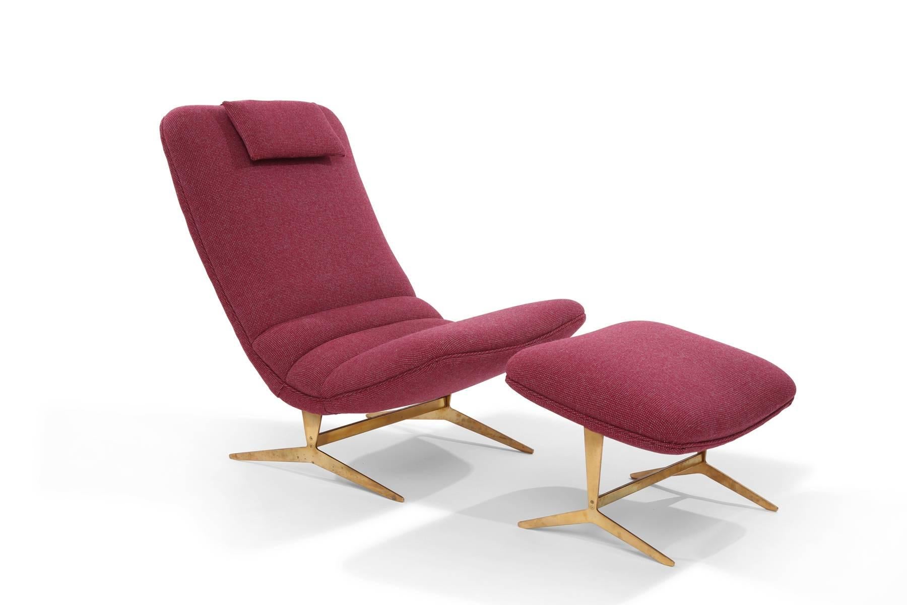 Stunning Italian lounge chair and ottoman, circa late 1950s. These examples have beautifully patinated solid brass bases and have been newly upholstered in a purple and gray wool textile. Price listed is for the chair and ottoman. Ottoman measures:
