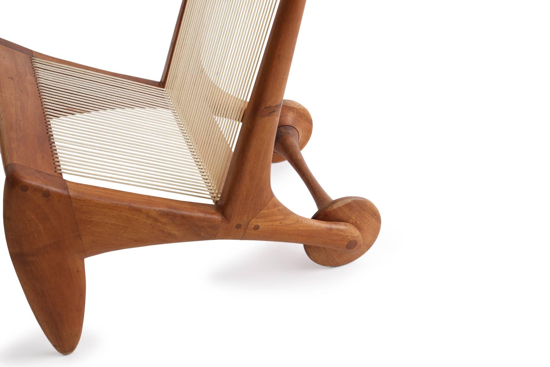Allen Ditson walnut and cord magazine holder, in the shape of a small chair, circa late 1950s. This all original one-off example is executed in beautifully grained walnut and was purchased directly from the family that it was originally commissioned