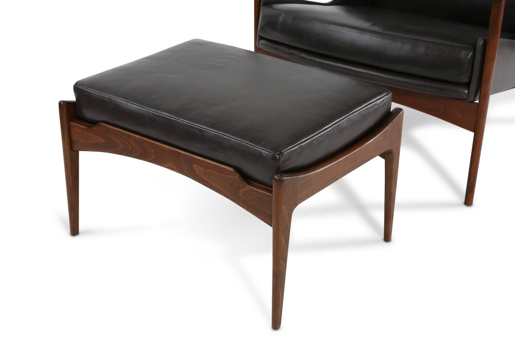 Mid-20th Century Ib Kofod Larsen Leather and Teak Lounge Chairs and Ottoman