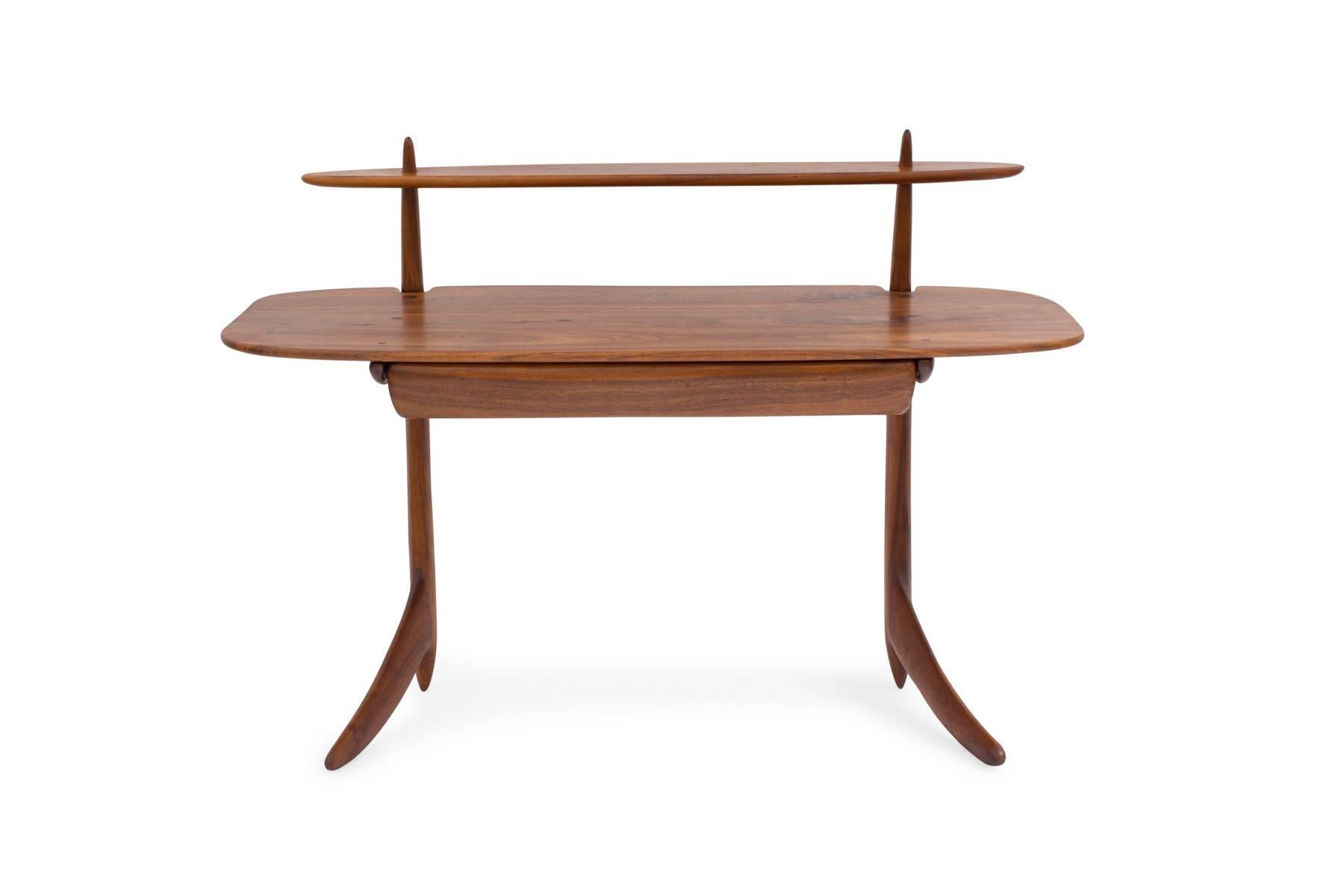Allen Ditson solid walnut desk, circa late 1950s. This amazing example was commissioned in 1957 and is one of only a few that were ever made. It is executed in beautifully grained solid walnut and has one large drawer, second tier and incredibly