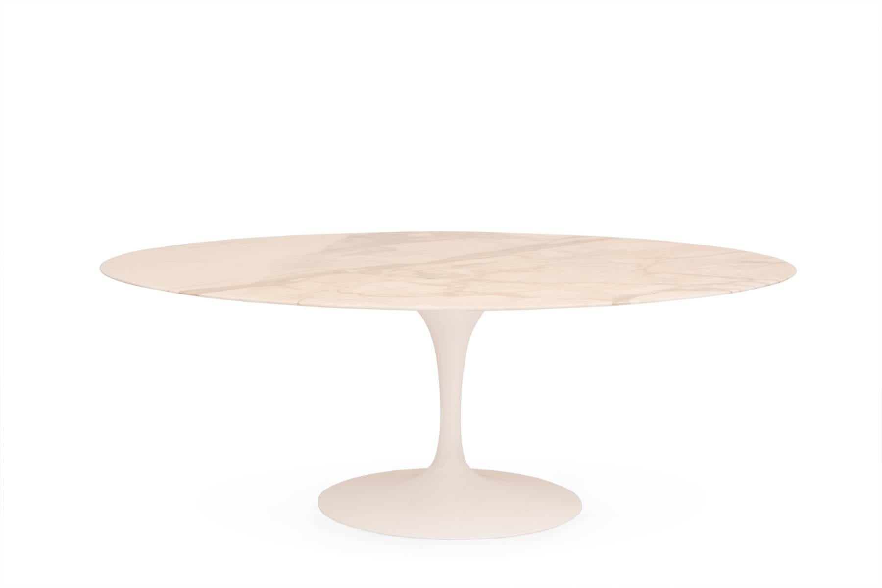 Eero Saarinen for Knoll Calacatta marble oval dining table, circa mid-1970s. This all original example has an incredibly grained knife edge marble top with the earlier iron base. Labeled and in excellent original condition.