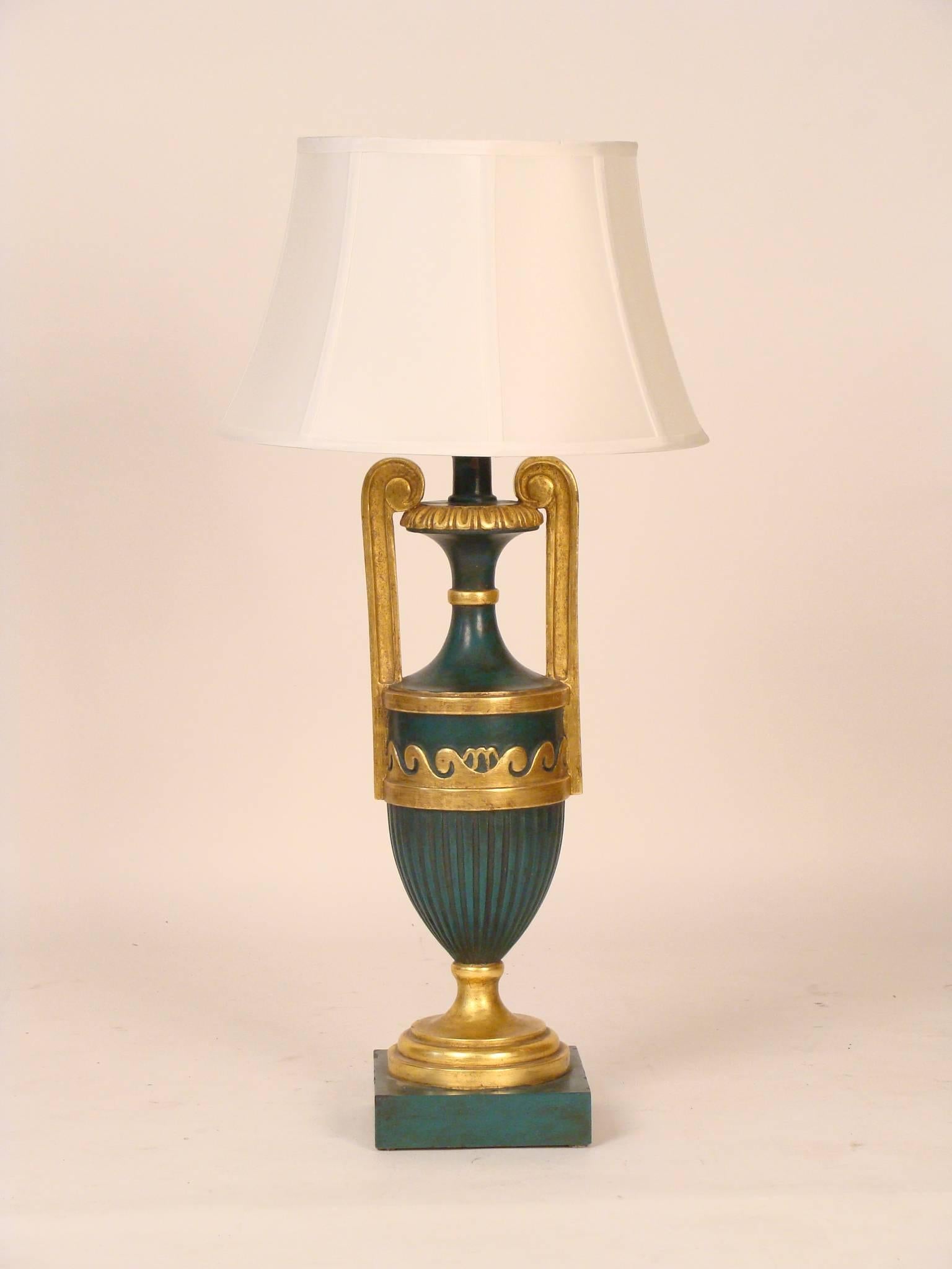 Pair of neoclassical style partial-gilt and painted lamps, circa 1990. Height to top of shades 31