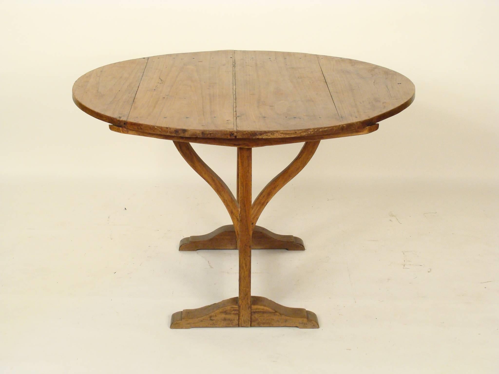 French beechwood tilt-top wine table, 19th century.