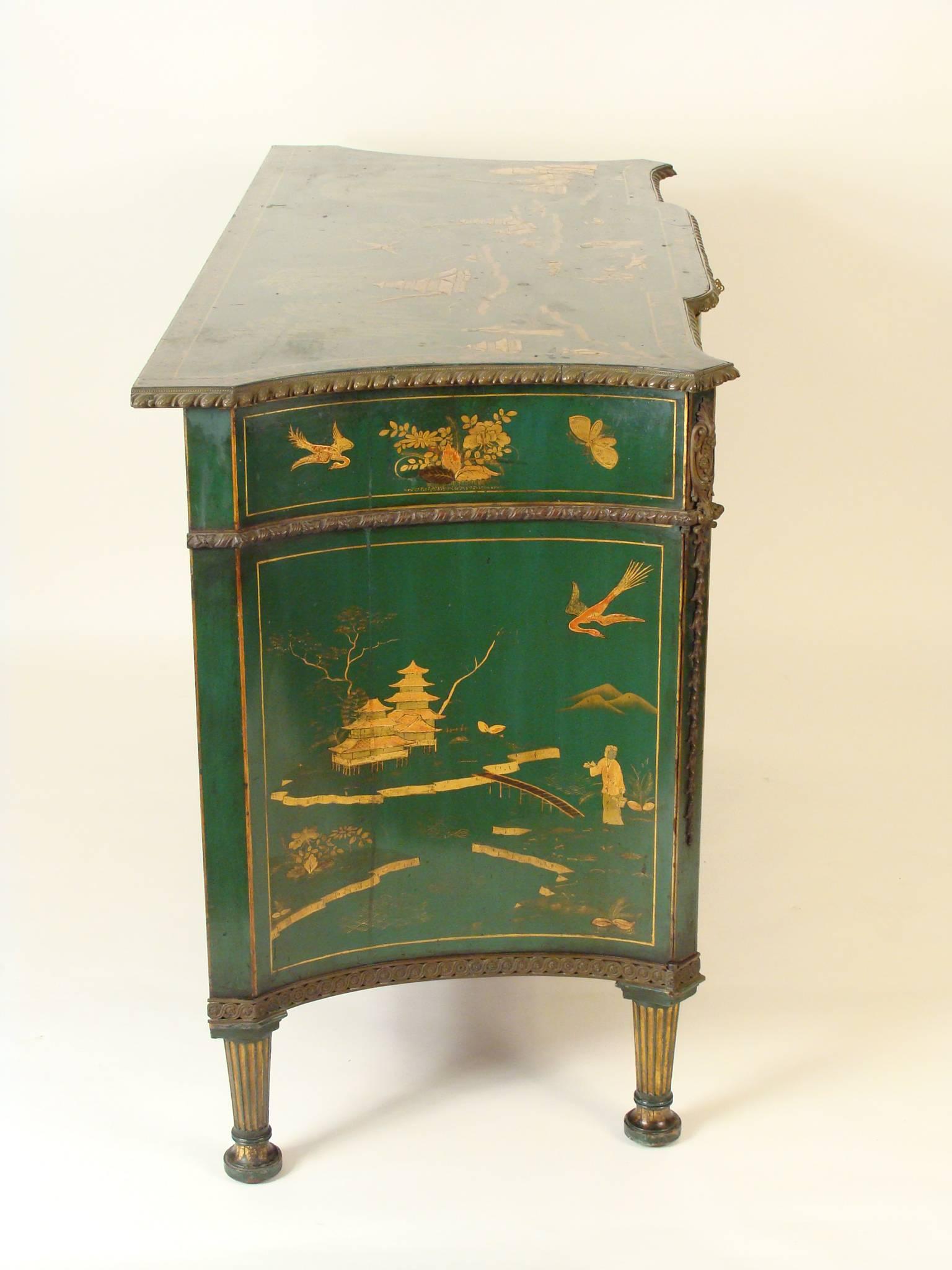Green chinoiserie decorated bronze-mounted Chippendale style cabinet, circa 1880. This cabinet has raised chinoiserie decorations and bronze mounts. The original of this cabinet was made by Thomas Chippendale for Nostell Priory in 1771. See the book