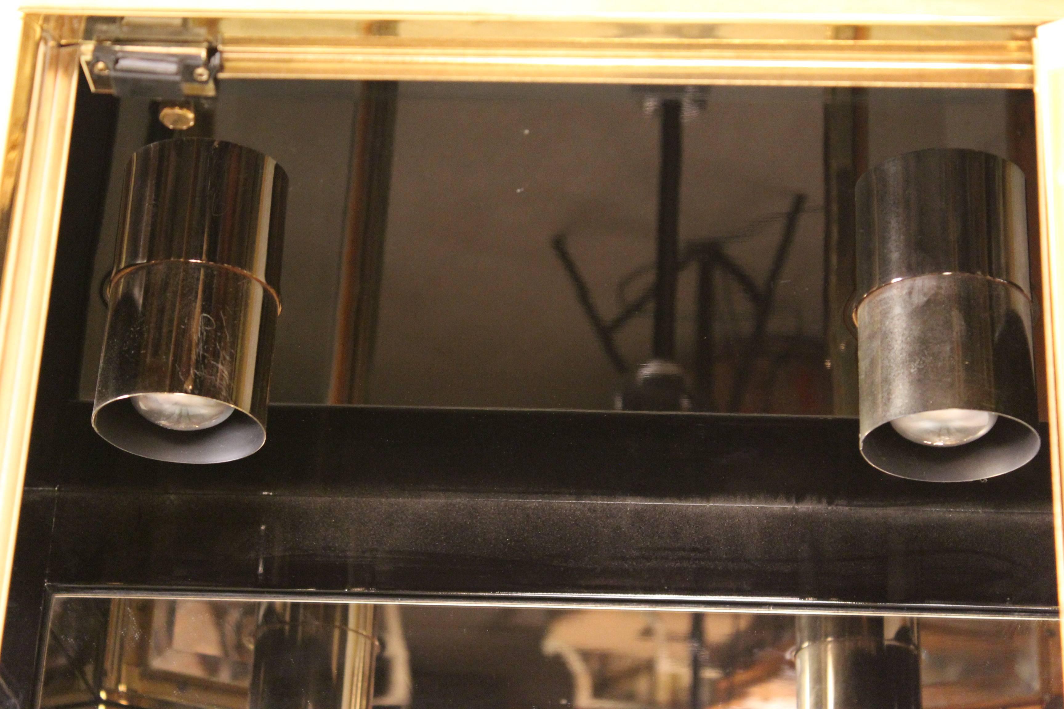 Glass Pair of Henredon Display Cabinets