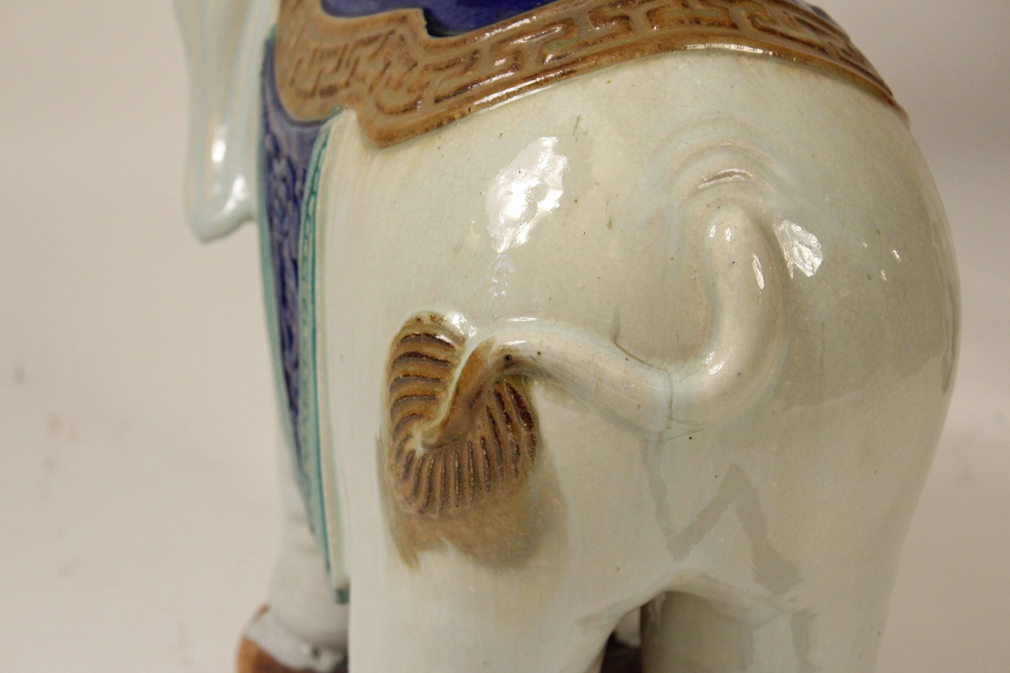 Paint Pair of Chinese stoneware elephant form tables