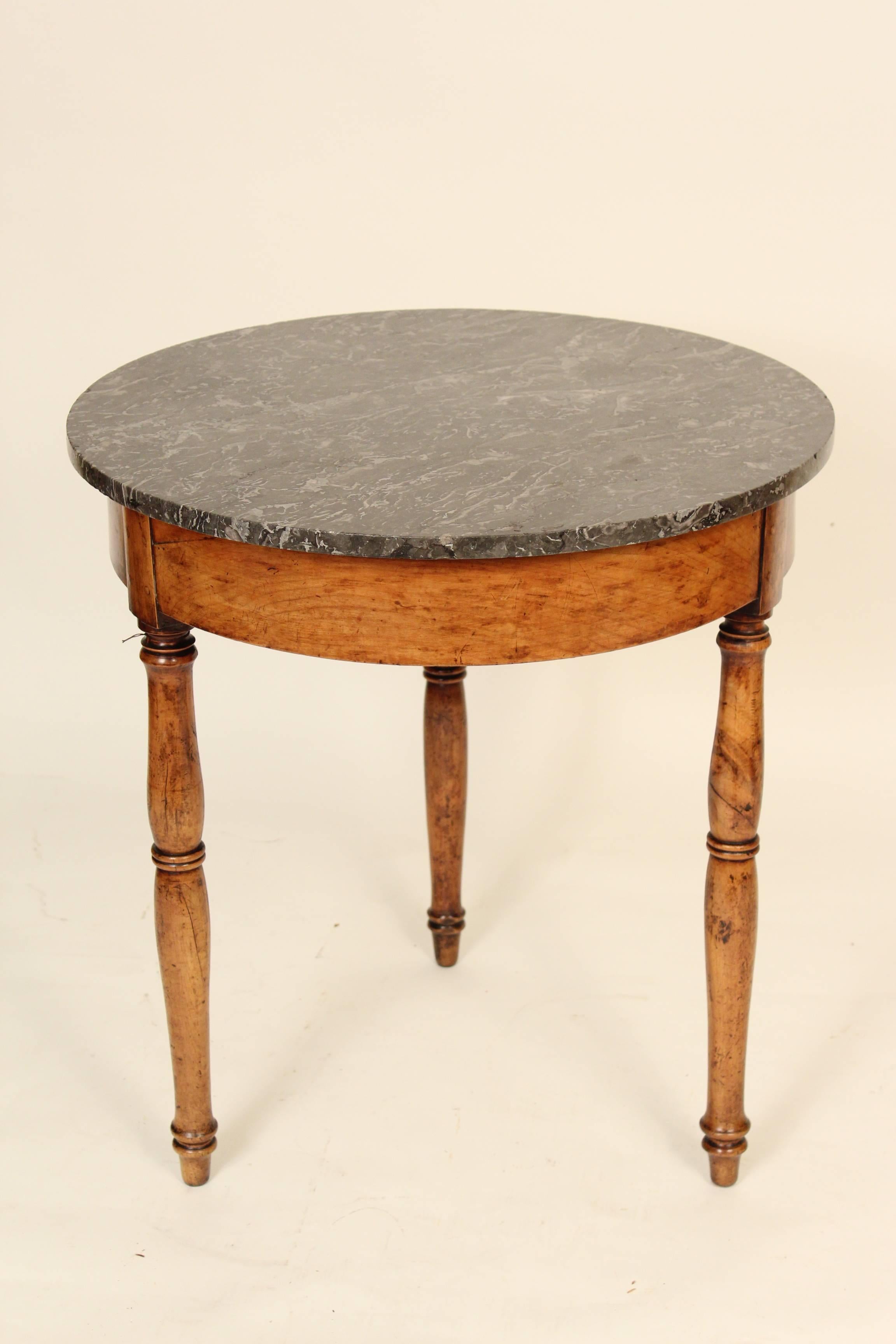 Louis Philippe fruit wood gueridon with a marble top, circa 1840. This table has very nice old color and an original marble-top.