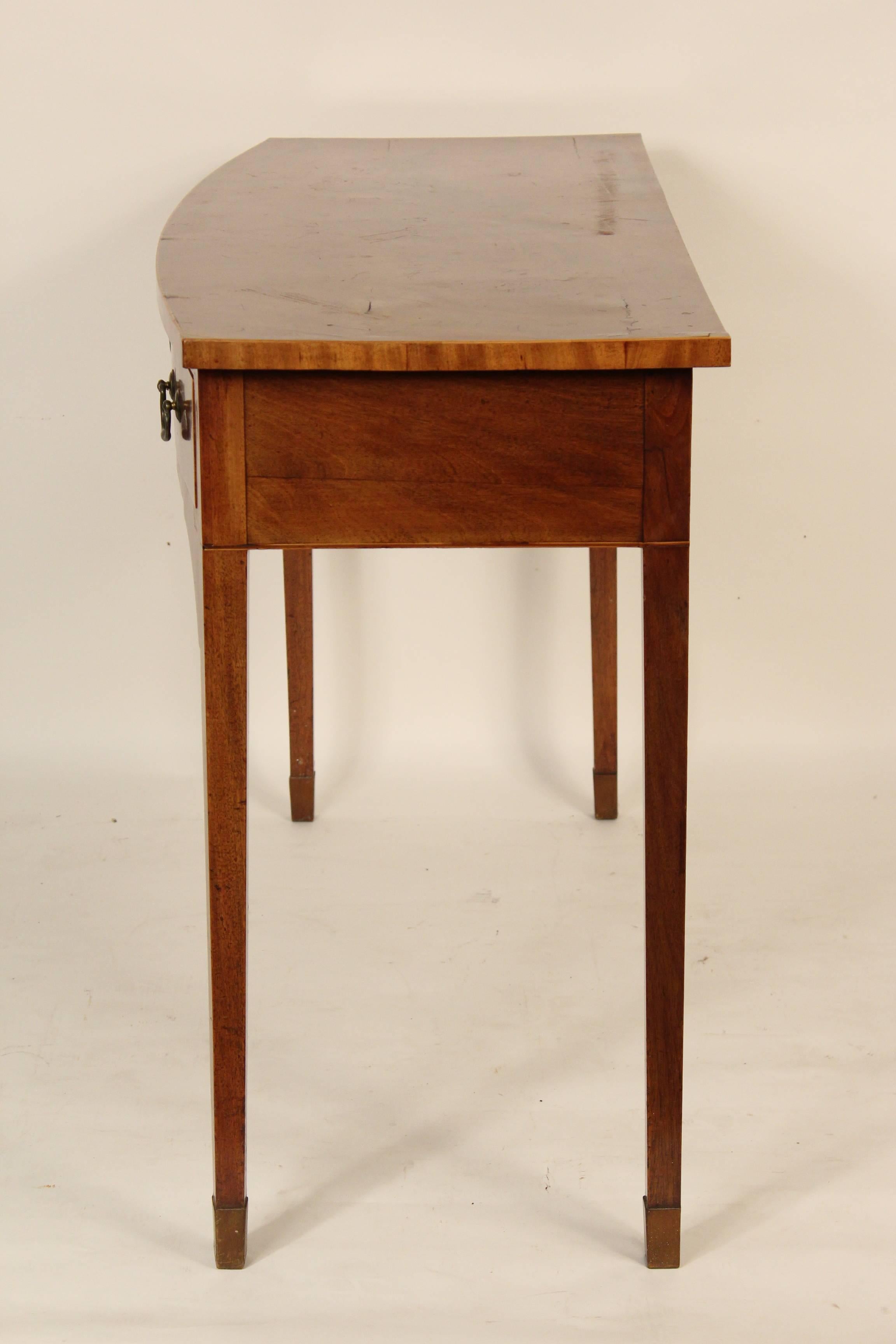 George III mahogany serving table with boxwood stringing, circa 1800. The bottom 2