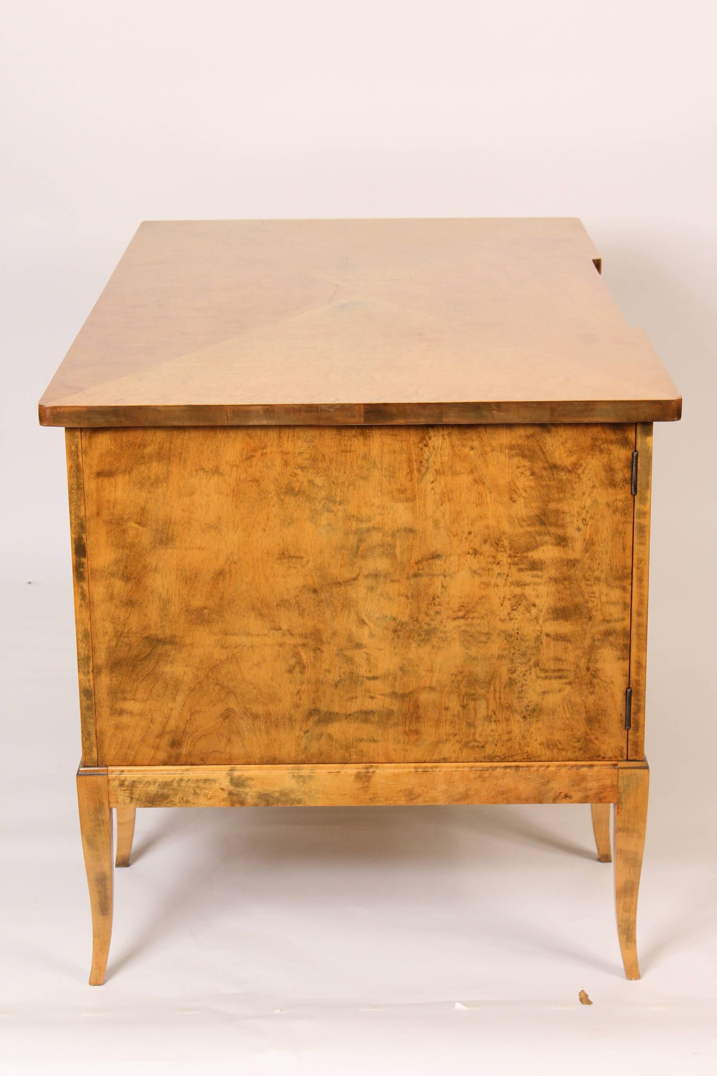 Biedermeier style desk with highly figured birch, circa mid-20th century. This desk has very fine quality figured birch, the construction is excellent with dove tailed drawers and the side panels are dovetailed into the base. This desk would go well
