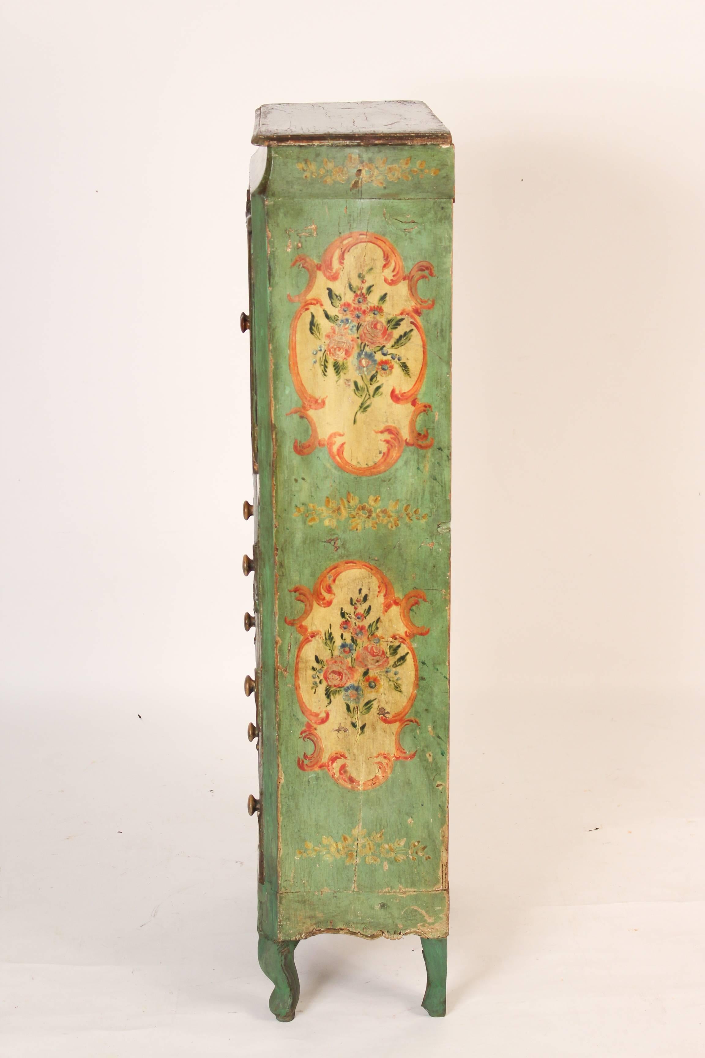 Italian Louis XV style painted cabinet with floral painted drawers and doors, late 19th century.
