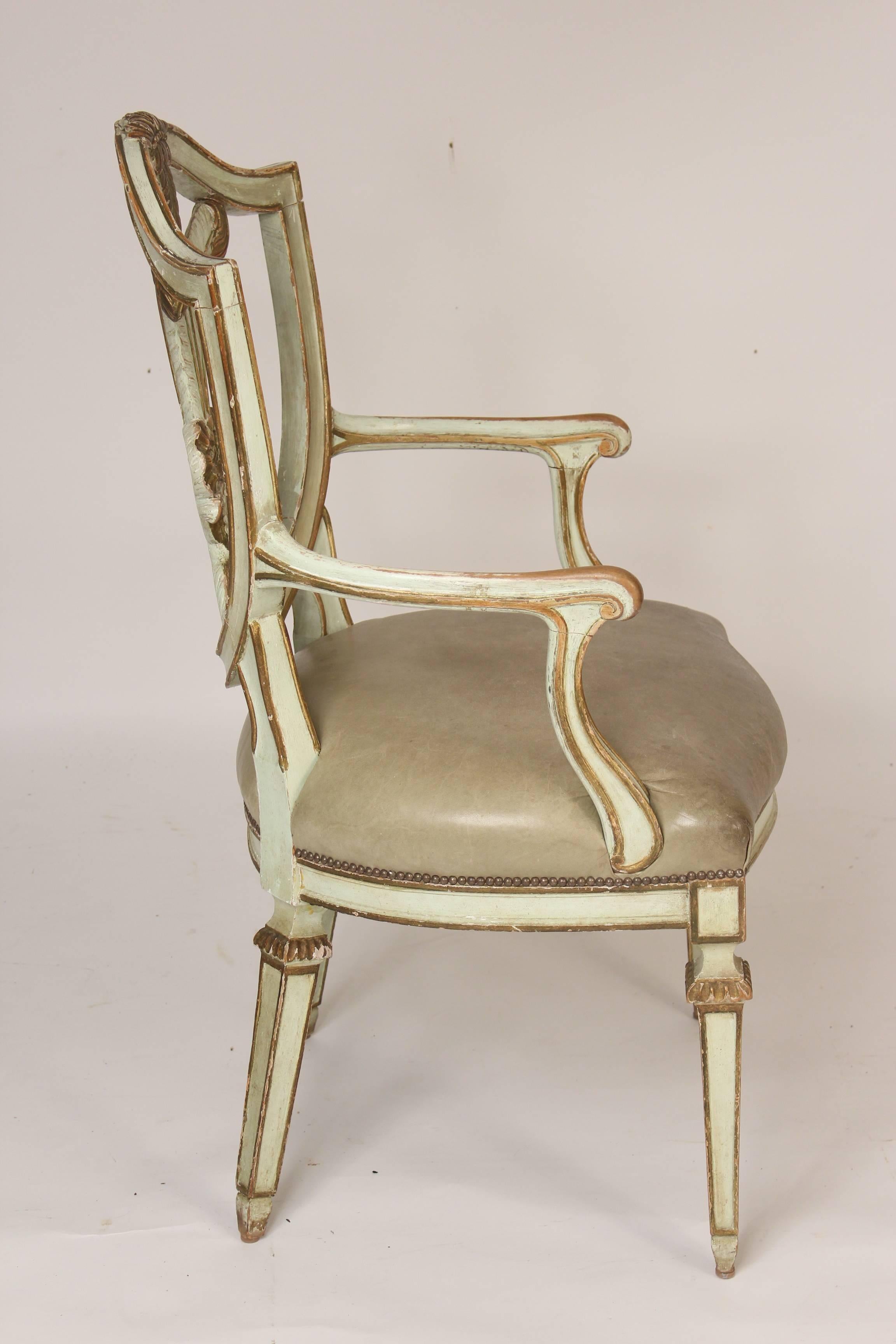 Continental neoclassical style painted and partial gilt armchair, late 19th century.