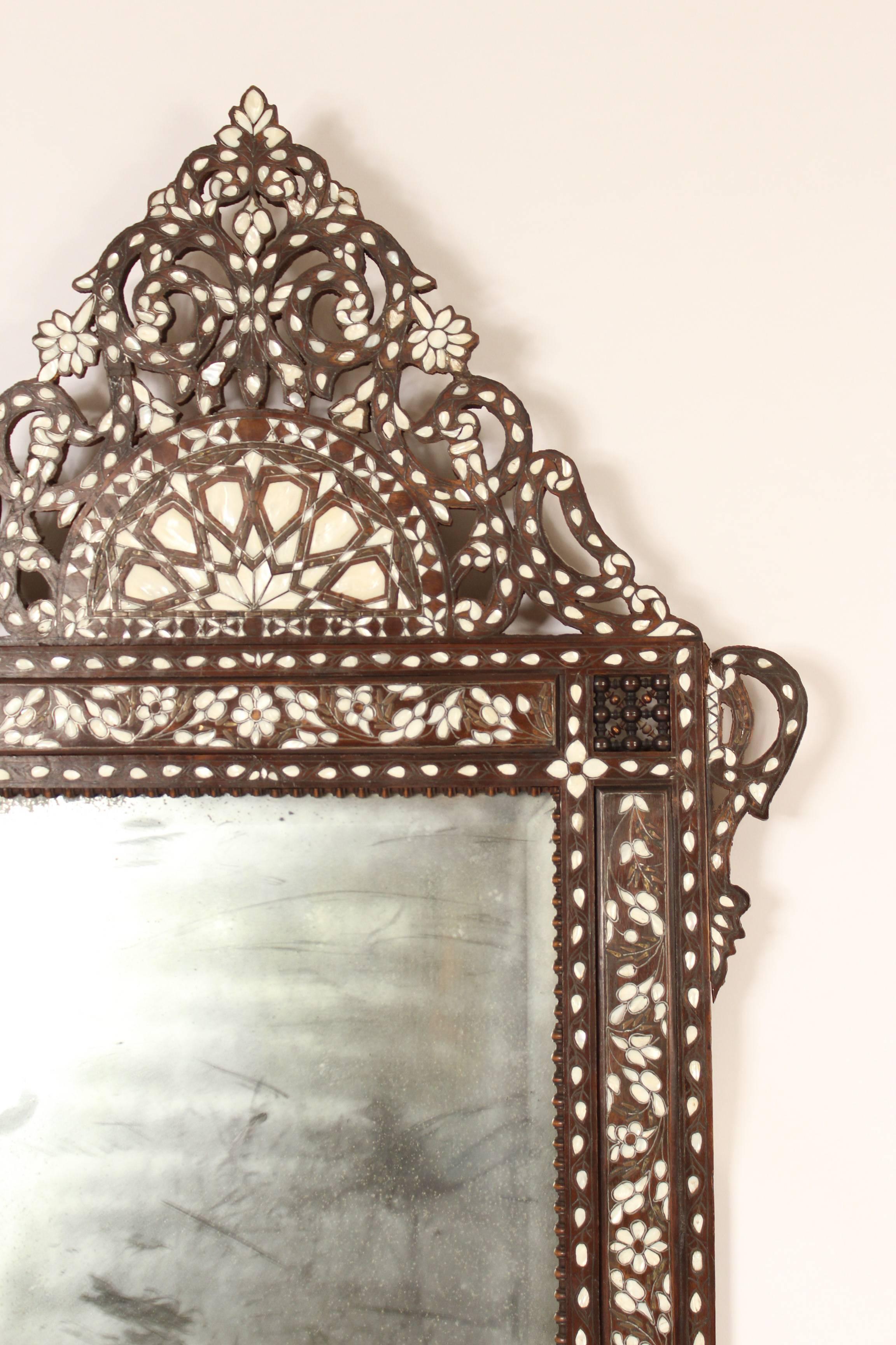 Middle eastern mother-of-pearl inlaid mirror, mid-20th century.