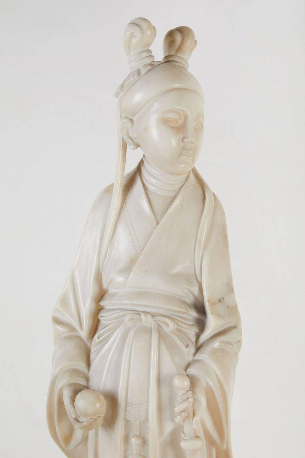 Italian, hand-carved, graceful Kwan sculpture in flowing robes. The figure stands on an octagonal, solid alabaster base and is mounted on a large, fluted, period, carved-wood column.

From an online website dedicated to deity descriptions:

Scholars