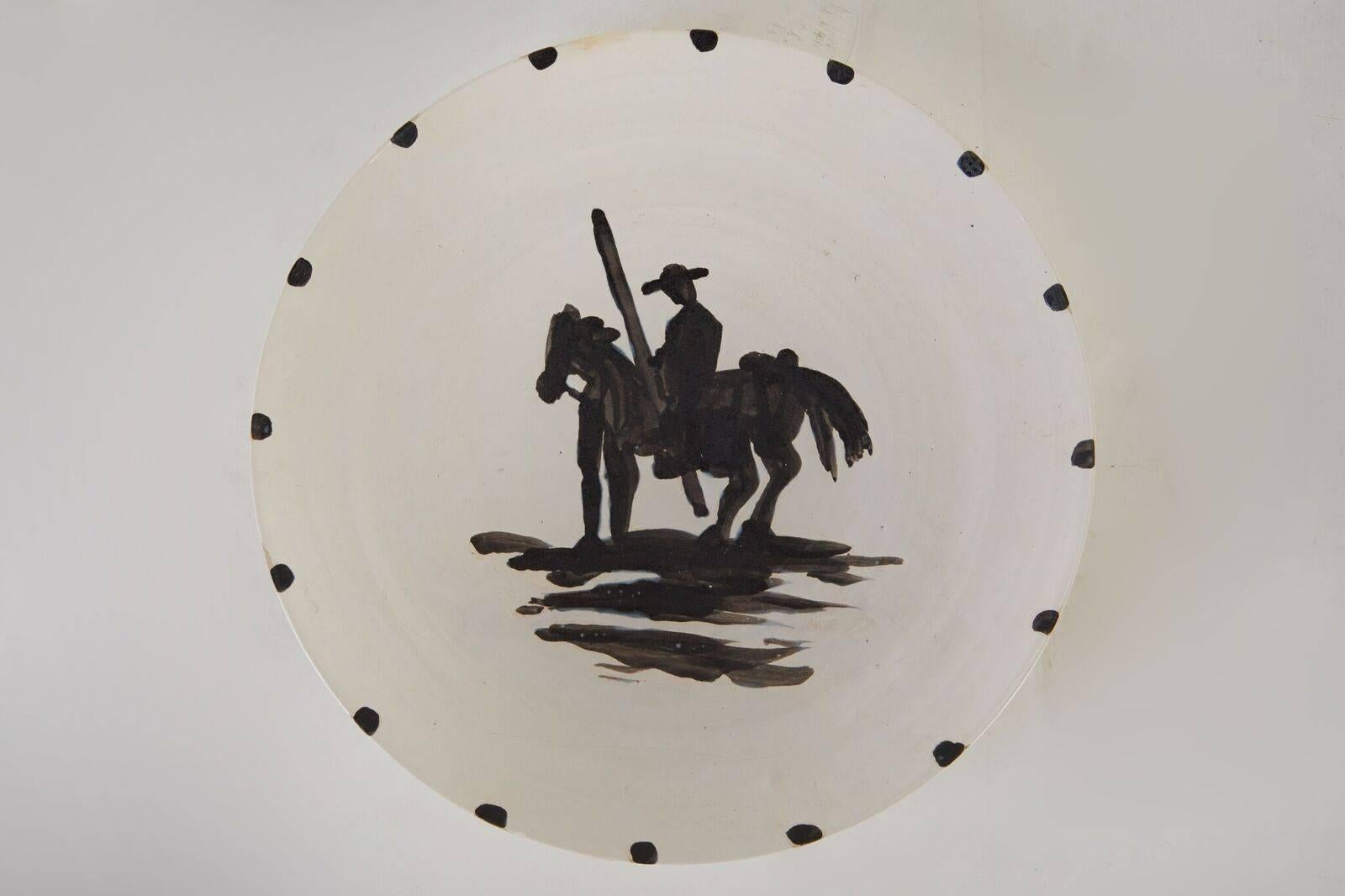 "Picador" aka "The Bullfighter", painted and glazed, limited edition, black and white, ceramic plate from the Madoura Factory in France. Stamp and edition notice, verso.