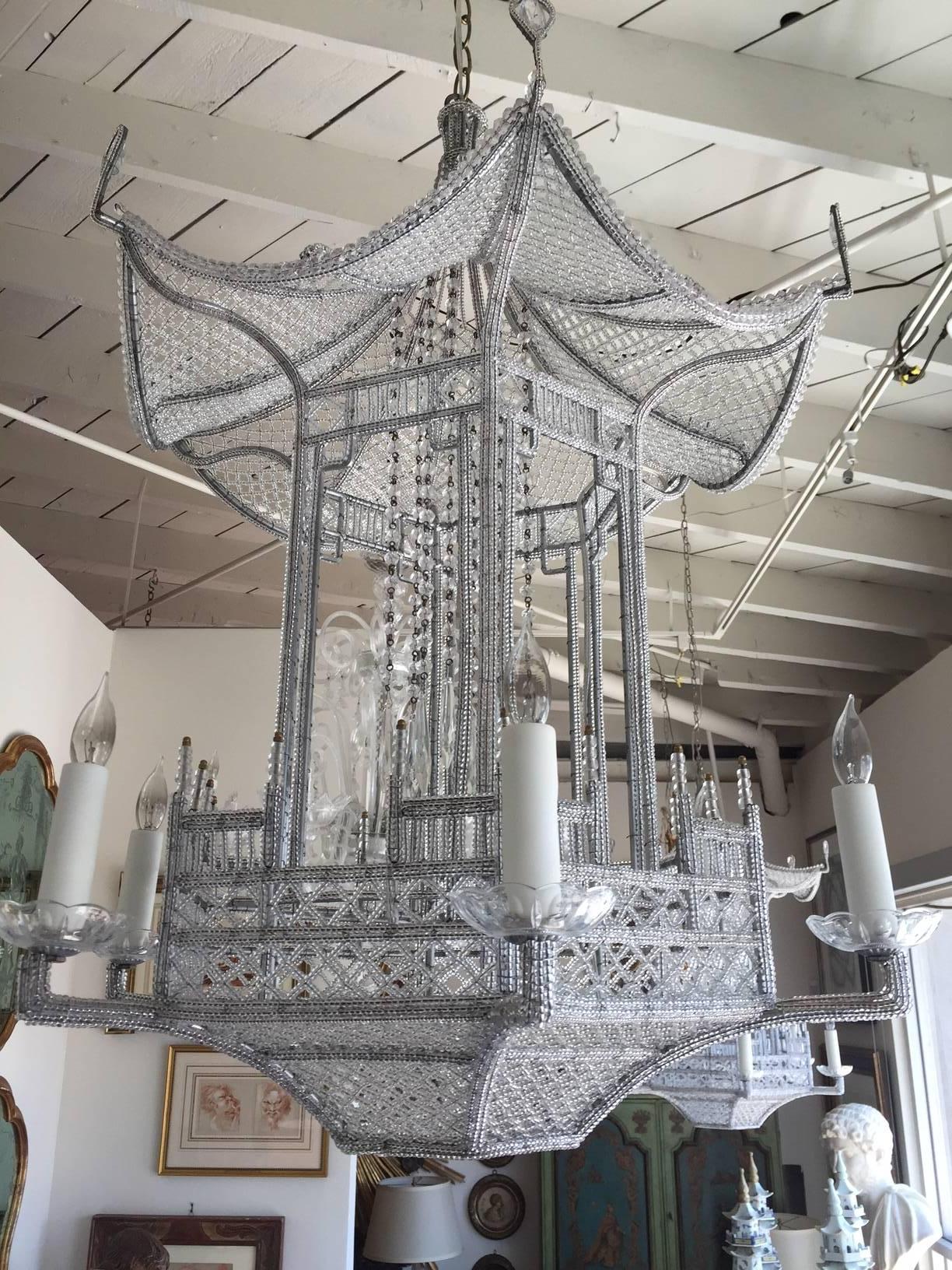 Large, sIlver-hued hand-beaded, six-arm pagoda chandelier from Sicily made exclusively for Antonio's Bella Casa. The center is embellished with generous, facteted crystal drops.