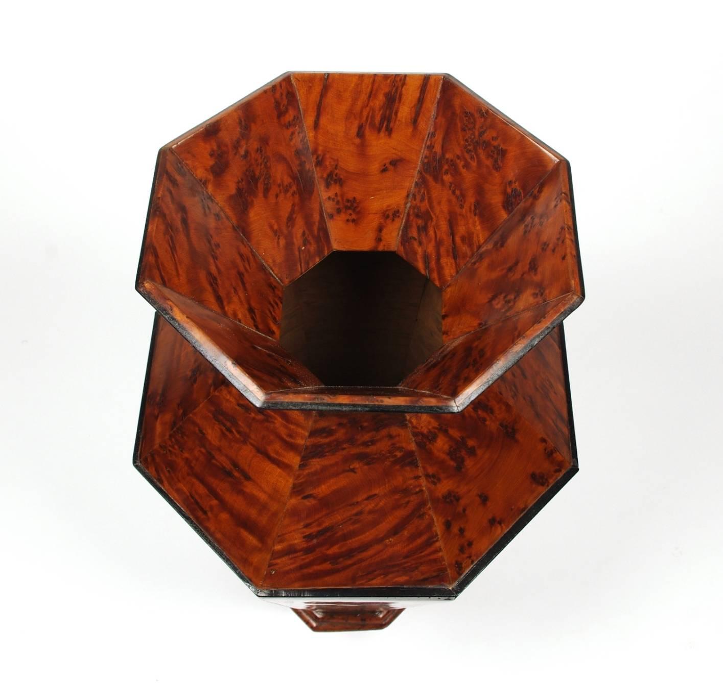 Rare Biedermeier burr yew spittoon of octagonal shape, the rim, neck and shoulder with ebony molding. Interestingly, spittoons were a standard home furnishing during the Biedermeier period. They were not placed discreetly in the corner, as we might