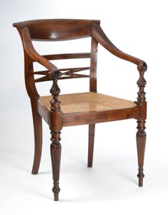 Set of Four British Colonial Hardwood Open Armchairs