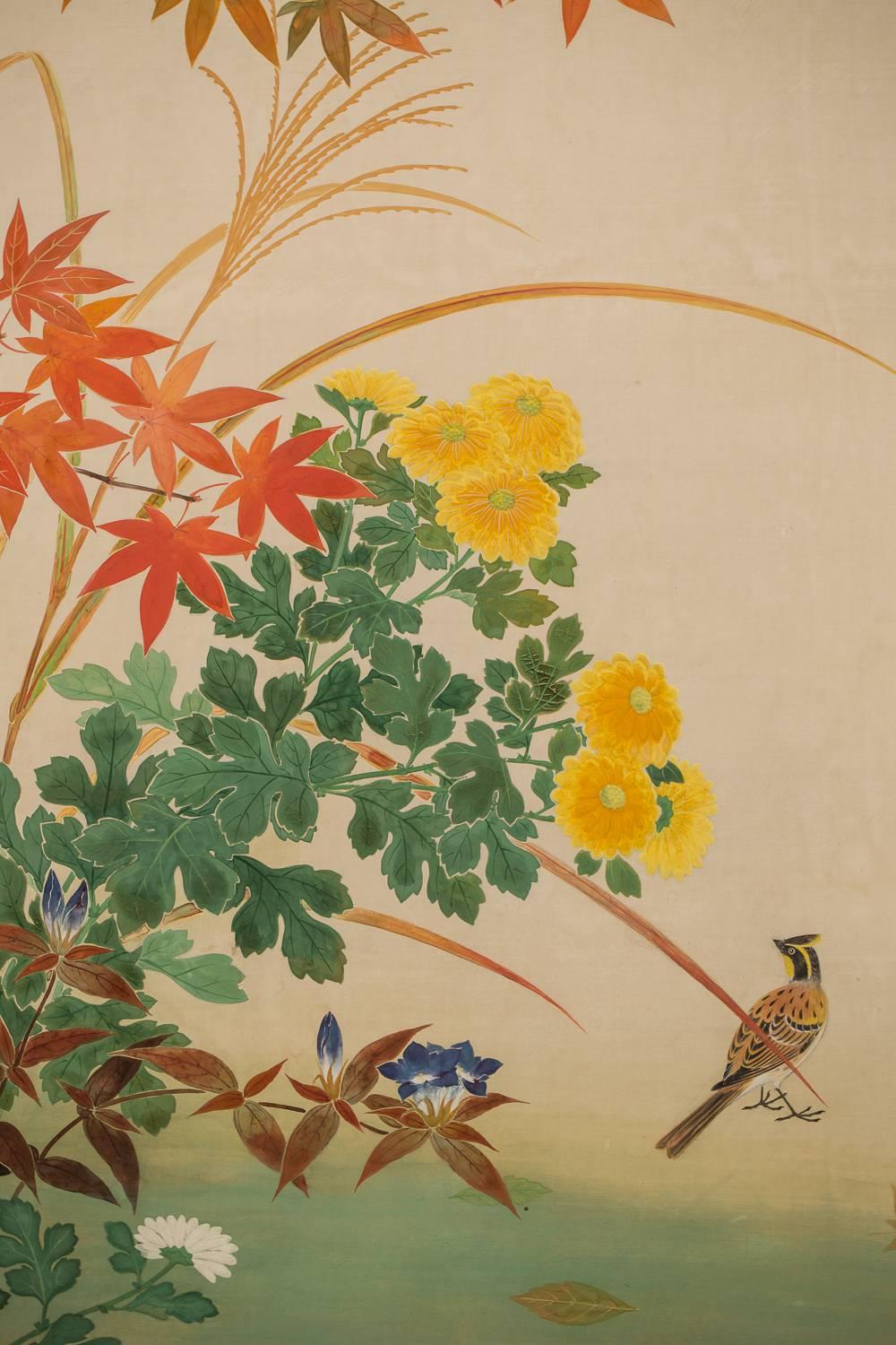 Japanese two panel screen, ‘Early Autumn Maple and Flowers’
mineral pigments on silk, with signature and seal on lower left: Reiro

Okumura Reiro (1901-1984), born in Tokyo. His young name was Suteo, he became a student of Katayama Nanpu. He