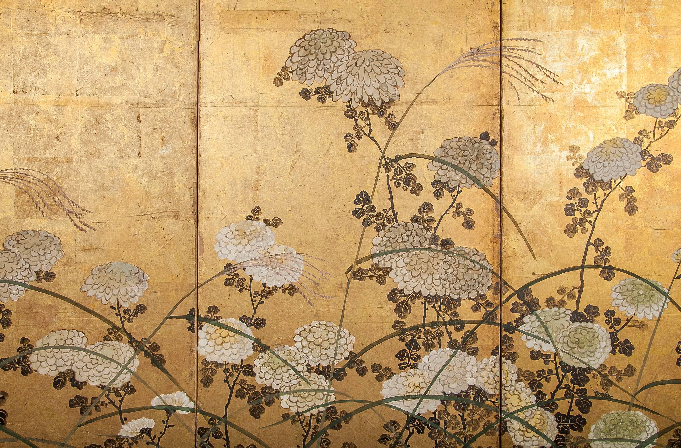 Japanese Screen White Chrysanthemums and Wild Grasses.  Chrysanthemums, or kiku, are the official symbol of imperial Japan.  The flower is also a symbol of national identity.  White chrysanthemums are thought to be particularly good luck, and here