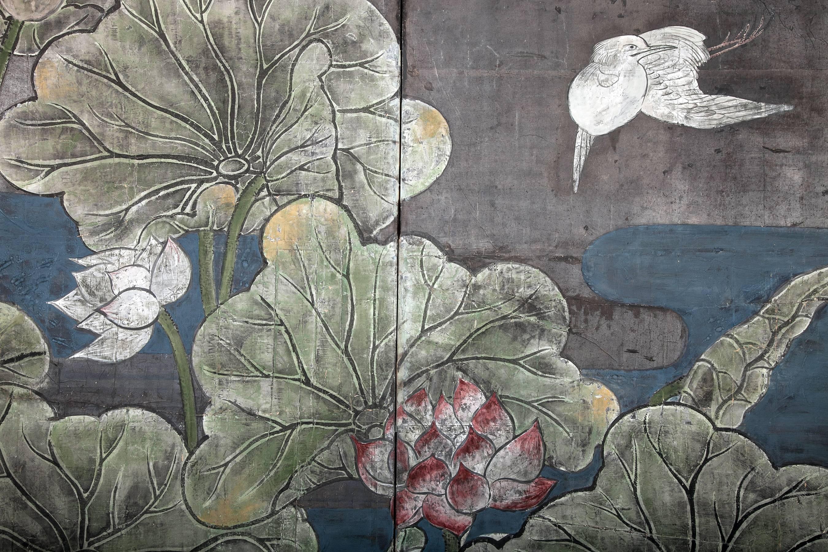 Japanese two panel screen, lotus and heron
Colored mineral pigments on silver leaf on handmade mulberry paper.