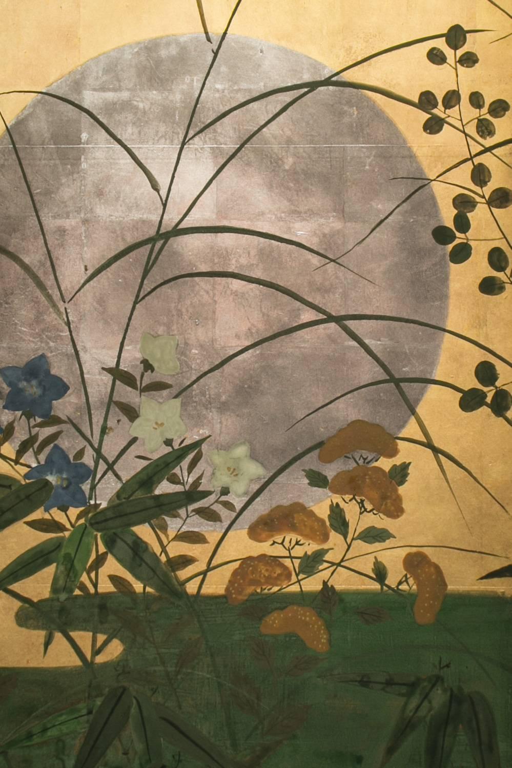 Japanese Six Panel Screen: Silver Moon Rising Over Summer Field.  Rimpa Style painting of a moon rising over summer flowers and grasses, including cockscomb and blue bellflowers.  Painted in mineral pigments on mulberry paper with a gold leaf ground