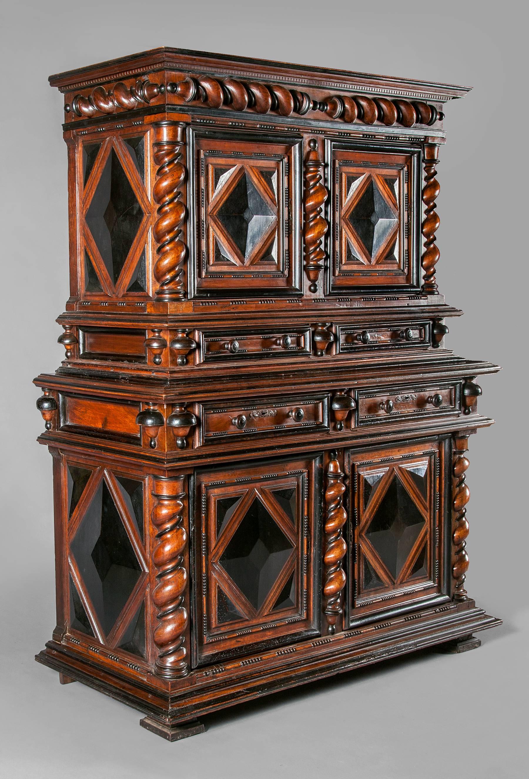 17th century French walnut cabinet. A two-part cabinet in Dutch style.