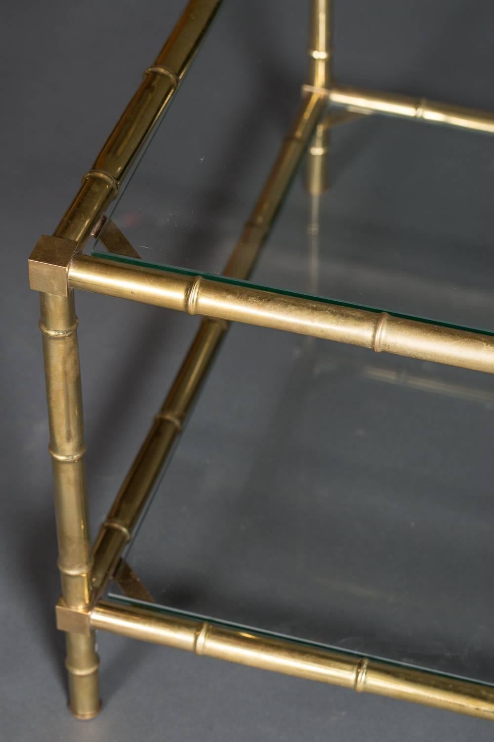 Faux bamboo brass and glass cocktail table in the style of Maison Baguès.
