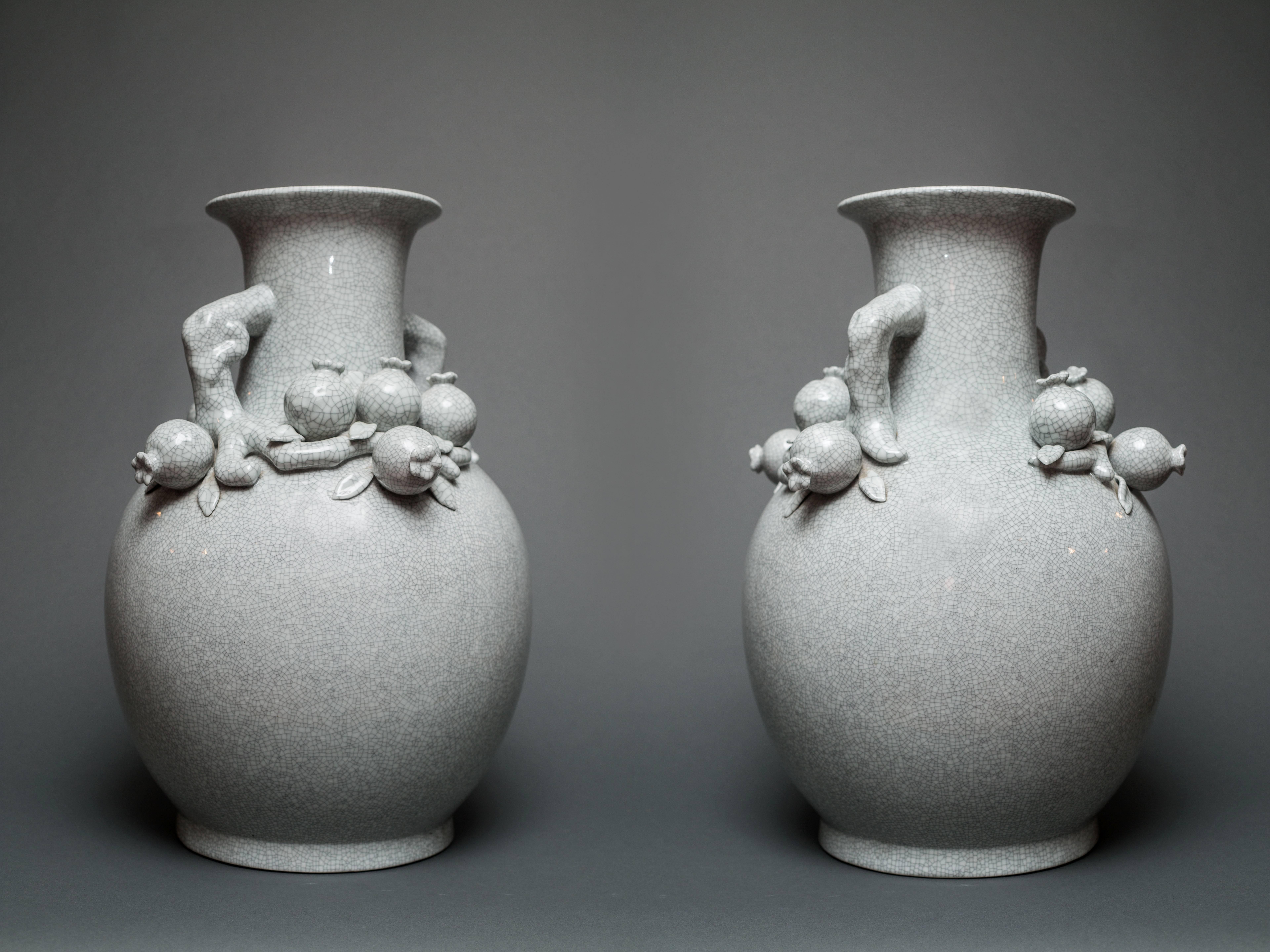 Pair of Chinese crackle vases with pomegranates.