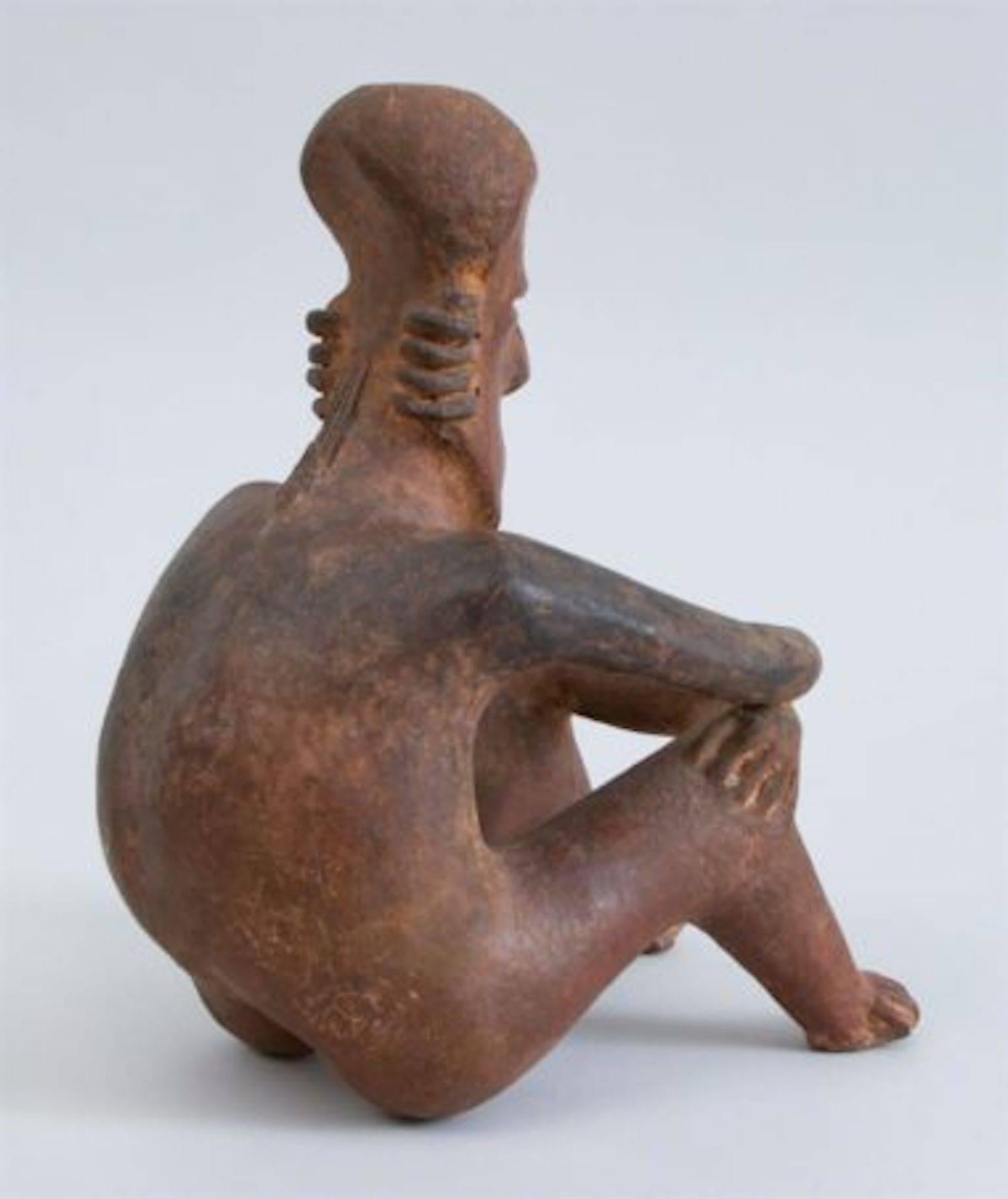 Pre-Columbian Red-Ground Pottery Seated Figure of a Man In Excellent Condition In Hudson, NY