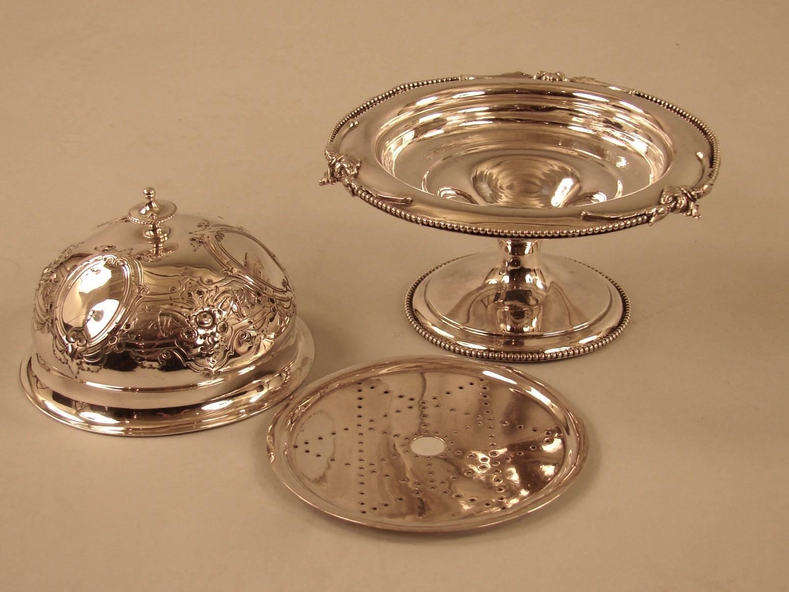 An American sterling silver covered butter dish made by W.K. Vanderslice & Co. of San Francisco, the interior with a pierced liner, circa 1880.