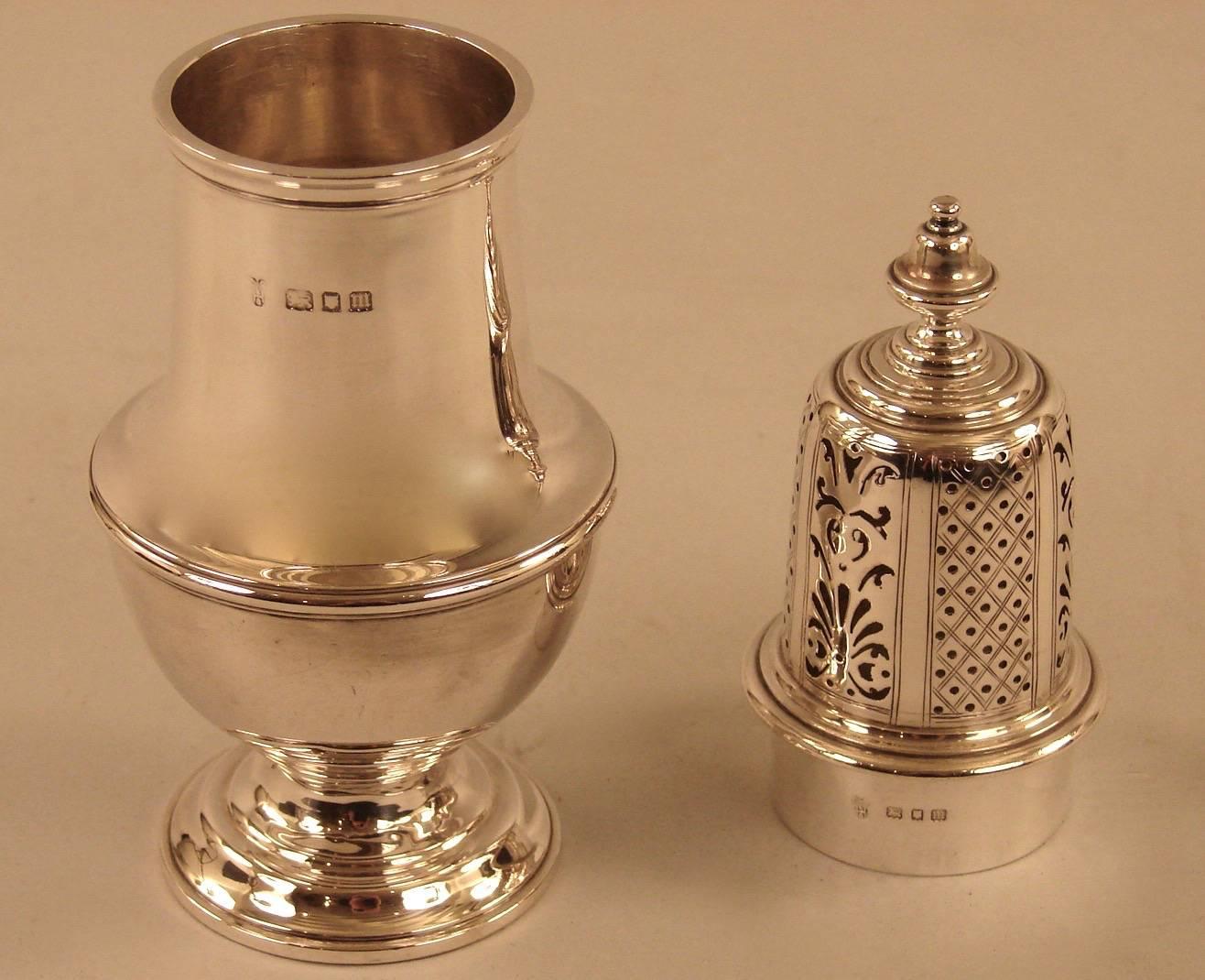 An English sterling muffineer of typical form hallmarked for London, 1867-1868.
